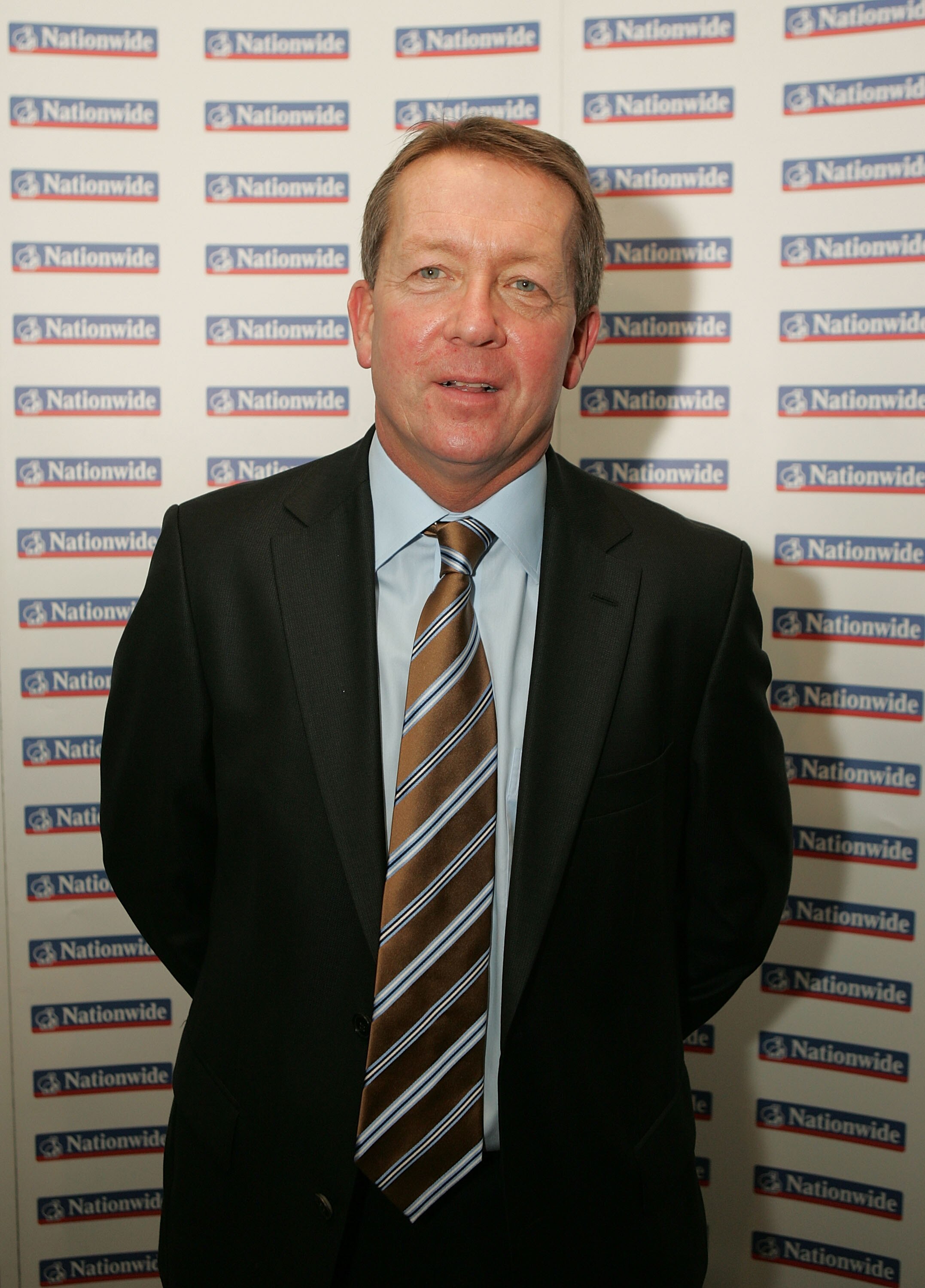 LONDON - FEBRUARY 03:  Alan Curbishley poses for the camera as he arrives for the HMV Football Extravaganza at the Grovesnor Hotel on February 3, 2009 in London, England.  (Photo by Christopher Lee/Getty Images)