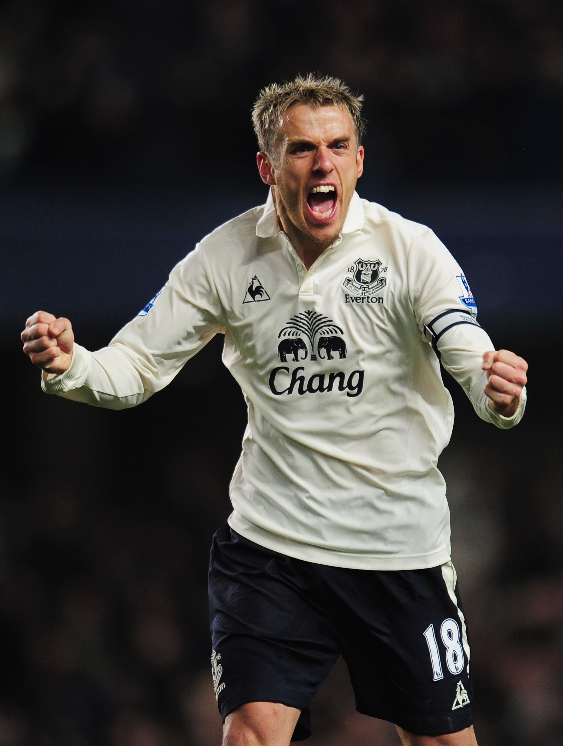 LONDON, ENGLAND - DECEMBER 04:  Phil Neville of Everton celebrates as Jermaine Beckford scores their first goal during the Barclays Premier League match between Chelsea and Everton at Stamford Bridge on December 4, 2010 in London, England.  (Photo by Shau