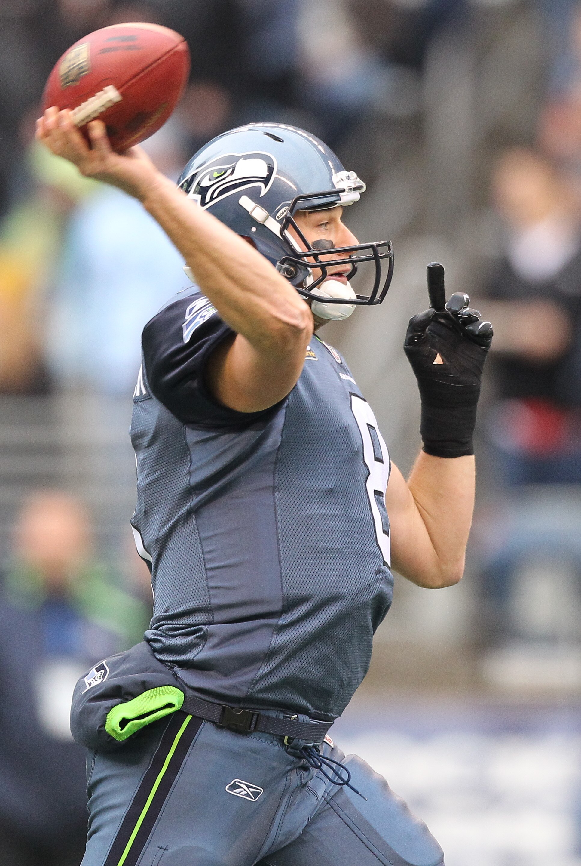 SEATTLE - DECEMBER 05:  Quarterback Matt Hasselbeck #8 of the Seattle Seahawks passes against the Carolina Panthers at Qwest Field on December 5, 2010 in Seattle, Washington. The Seahawks won, 31-14. (Photo by Otto Greule Jr/Getty Images)