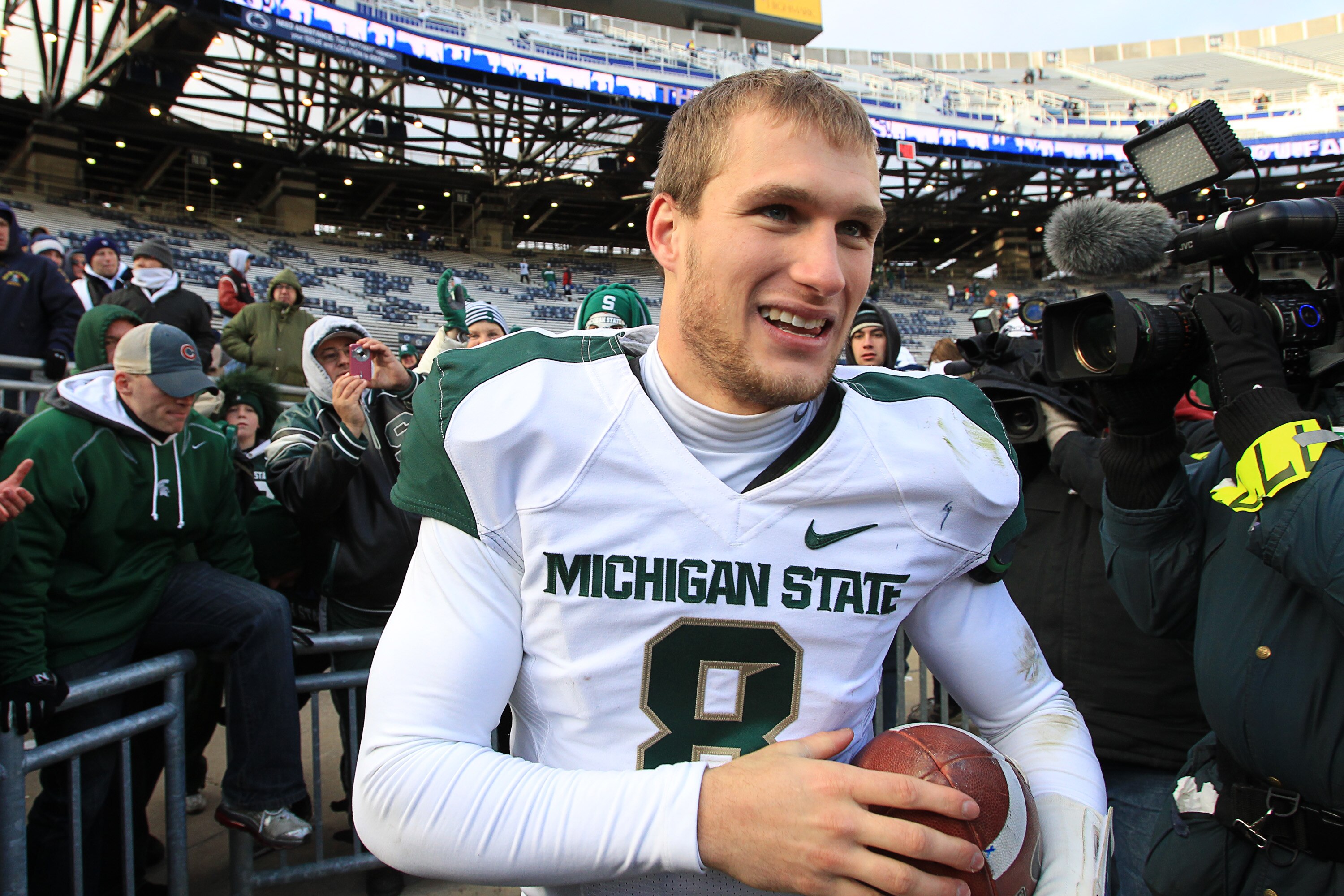 STATE COLLEGE, PA - NOVEMBER 27: Quarterback Kirk Cousins #8 of the Michigan State Spartans leaves the field after winning the Big Ten championship after a game against the Penn State Nittany Lions on November 27, 2010 at Beaver Stadium in State College,