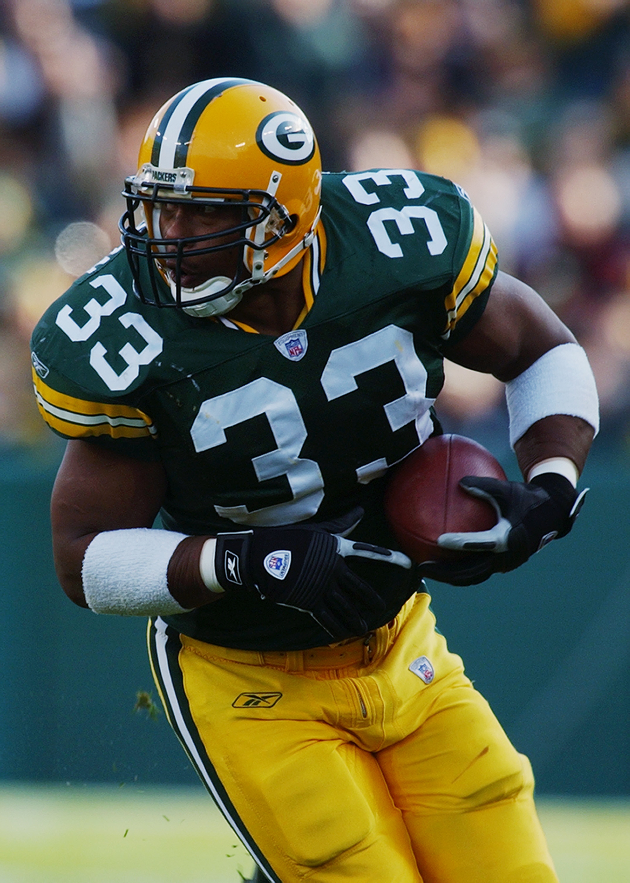 GREEN BAY, WI - OCTOBER 20:   Full back William Henderson #33 of the Green Bay Packers has control of the ball during the NFL game against the Washington Redskins at Lambeau Field on October 20, 2002 in Green Bay, Wisconsin.  (Photo by Jonathan Daniel/Get