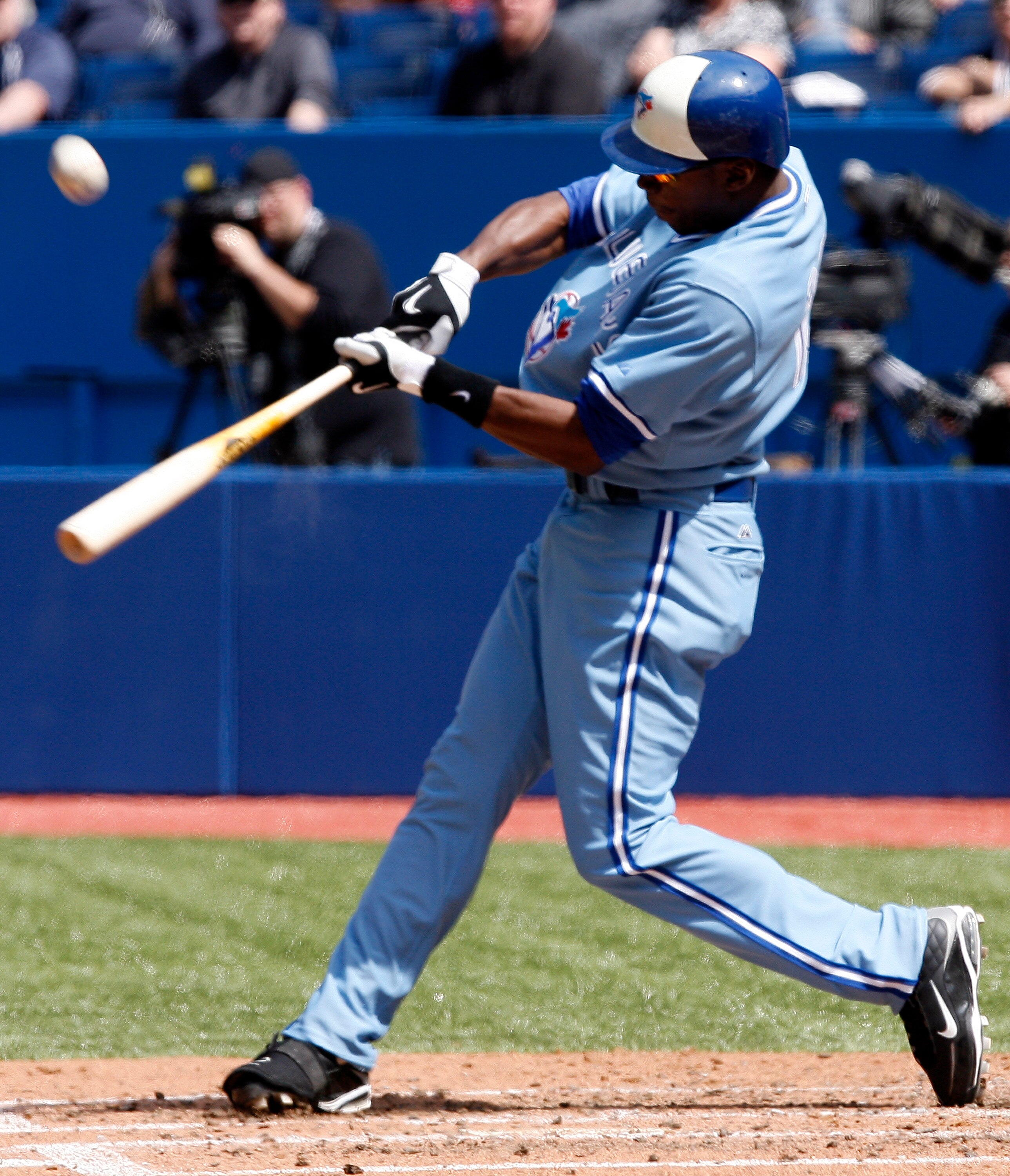 TORONTO - APRIL 21: Fred Lewis #15 of the Toronto Blue Jays hits an RBI single against the Kansas City Royals during a MLB game at the Rogers Centre April 21, 2010 in Toronto, Ontario, Canada. (Photo by Abelimages / Getty Images)