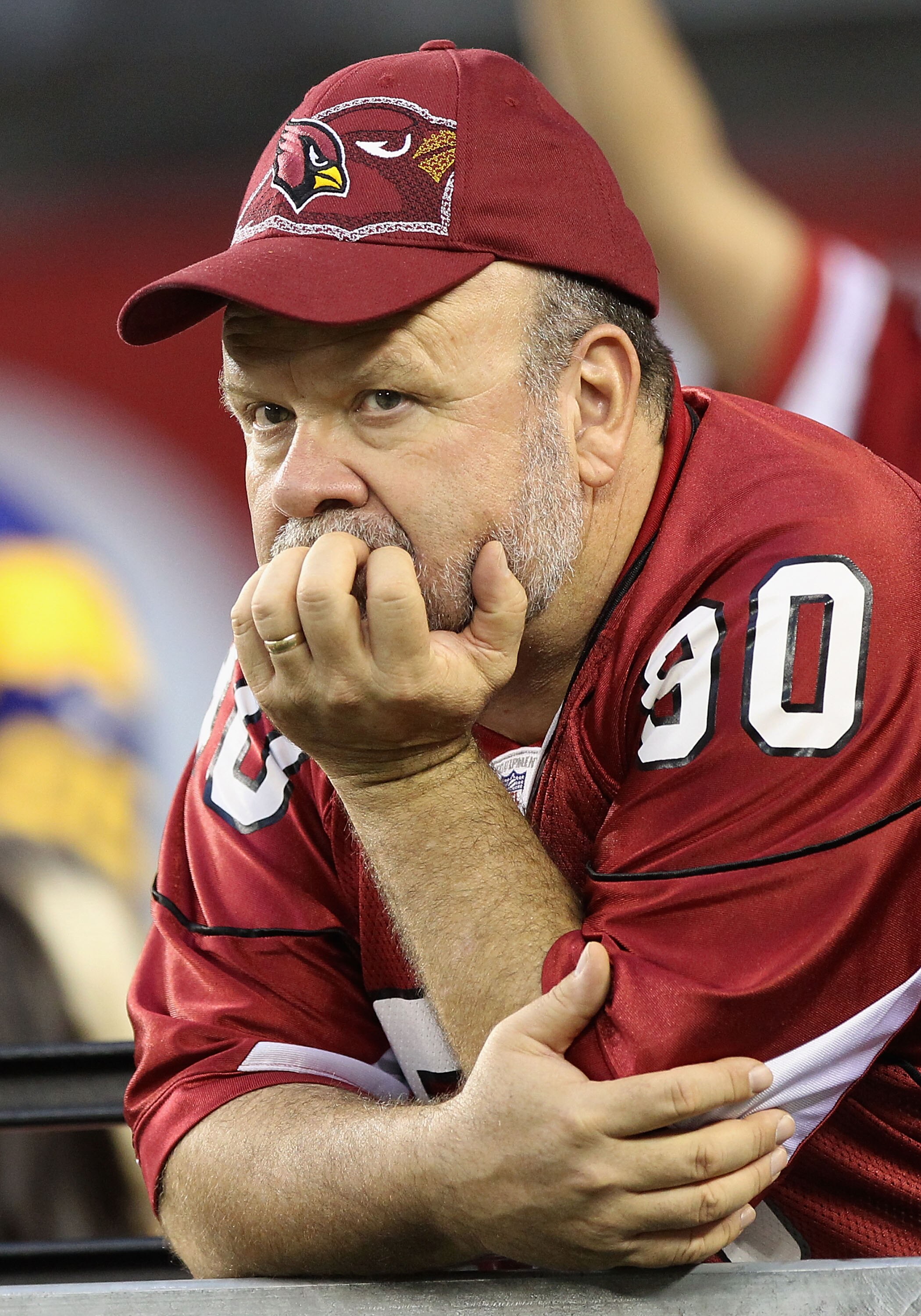 GLENDALE, AZ - DECEMBER 05:  Fans of the Arizona Cardinals react during the NFL game against the St. Louis Rams at the University of Phoenix Stadium on December 5, 2010 in Glendale, Arizona.  The Rams defeated the Cardinals 19-6. (Photo by Christian Peter
