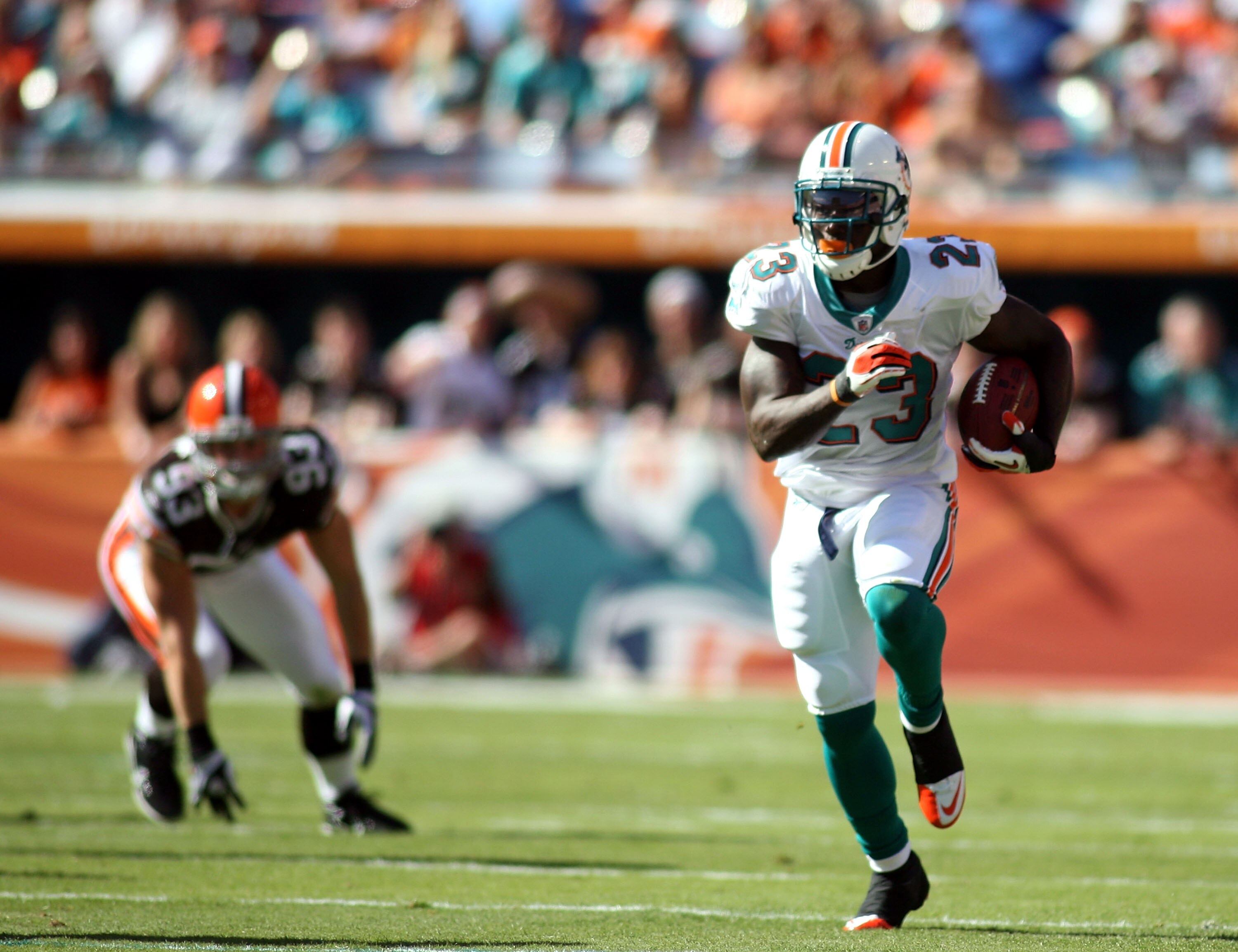 MIAMI, FL - DECEMBER 05:  Running back Ronnie Brown #23 of the miami Dolphins carries against the Cleveland Browns at Sun Life Stadium on December 5, 2010 in Miami, Florida. Cleveland defeated Miami 13-10.  (Photo by Marc Serota/Getty Images)