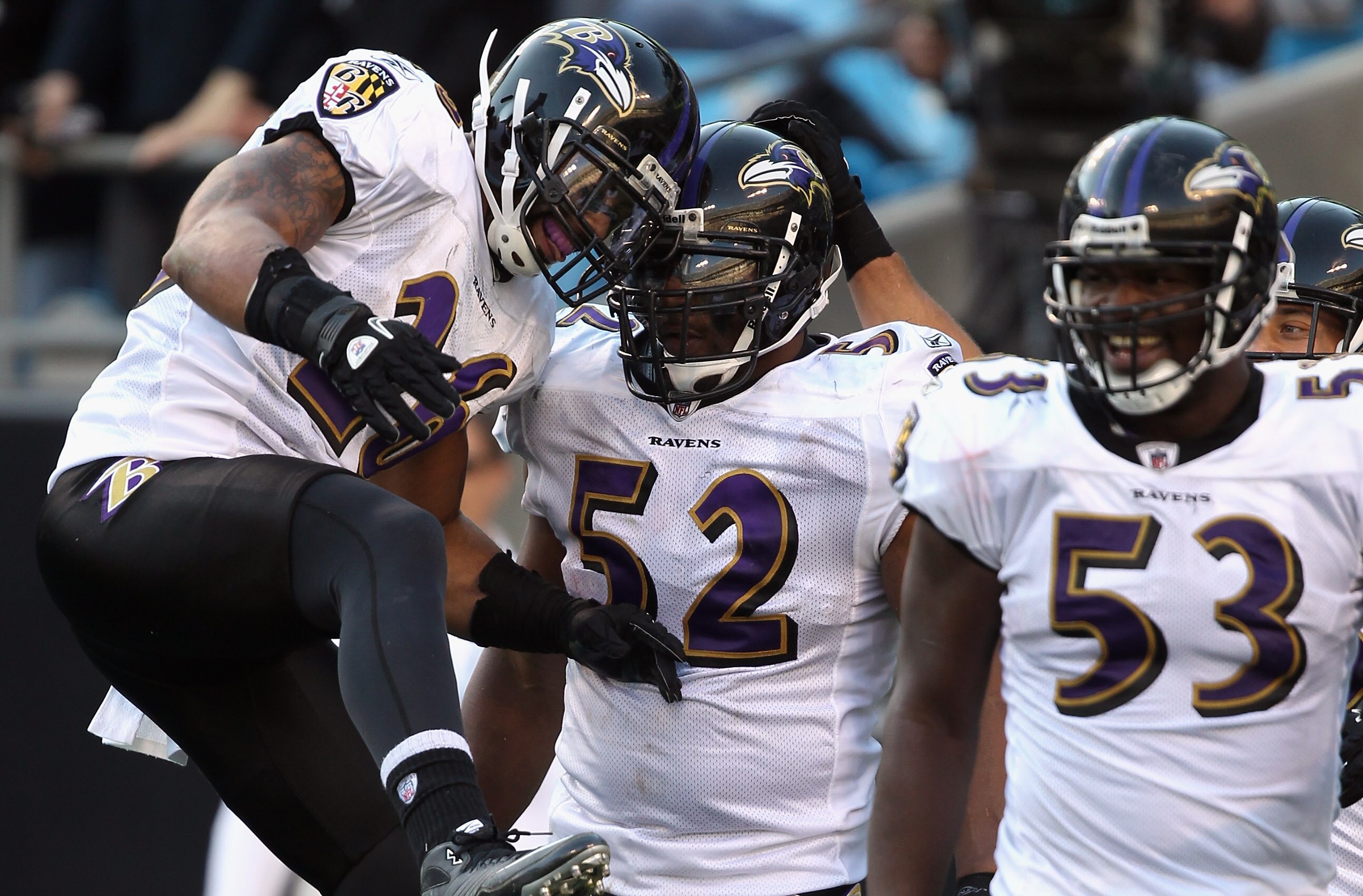 CHARLOTTE, NC - NOVEMBER 21:  Ray Lewis #52 of the Baltimore Ravens celebrates with teammates Dawan Landry #26 and Jameel McClain #53 after scoring a touchdown against the Carolina Panthers at Bank of America Stadium on November 21, 2010 in Charlotte, Nor