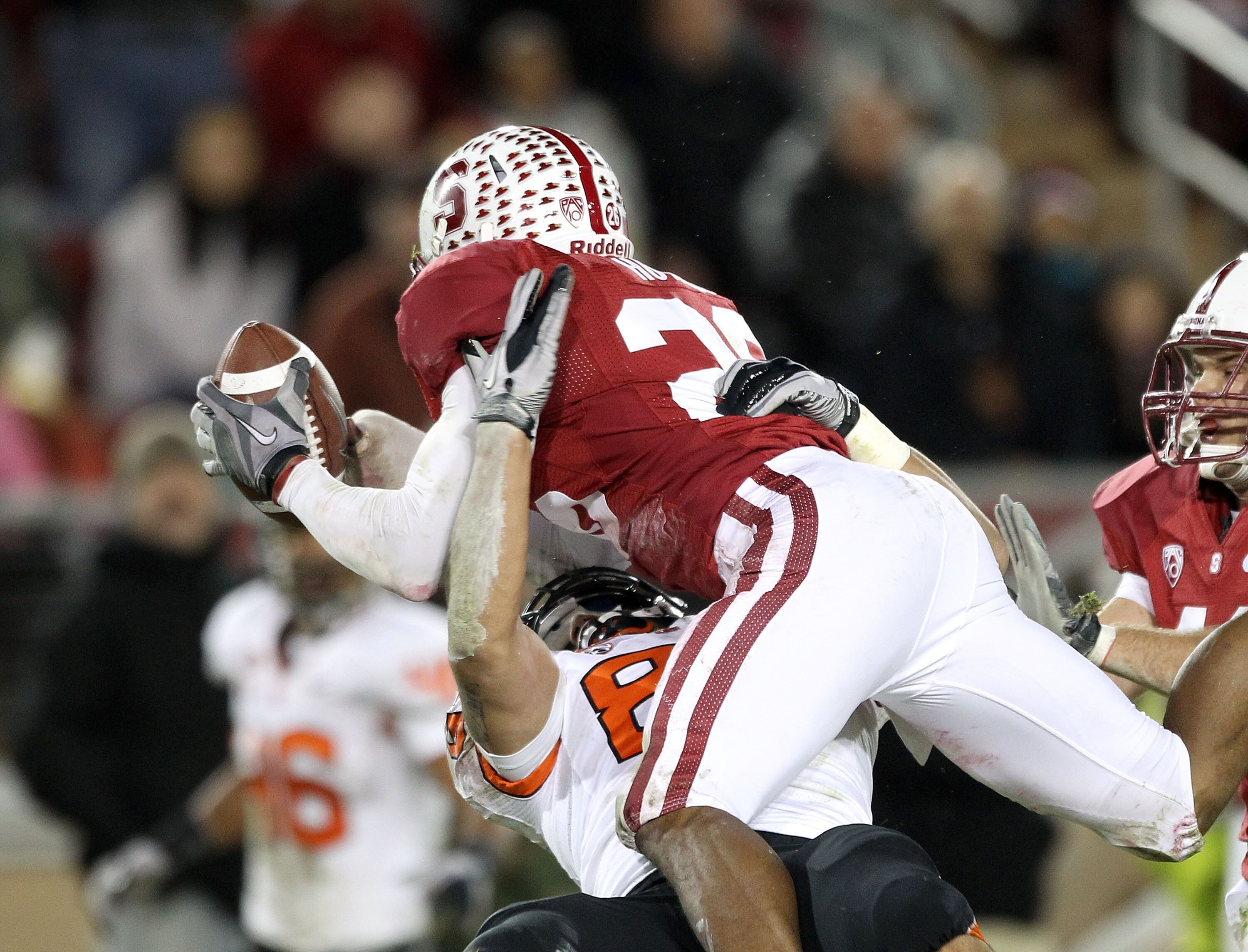 PALO ALTO, CA - NOVEMBER 27:  Delano Howell #26 of the Stanford Cardinal makes an interception intended for Joe Halahuni #87 of the Oregon State Beavers at Stanford Stadium on November 27, 2010 in Palo Alto, California.  (Photo by Ezra Shaw/Getty Images)