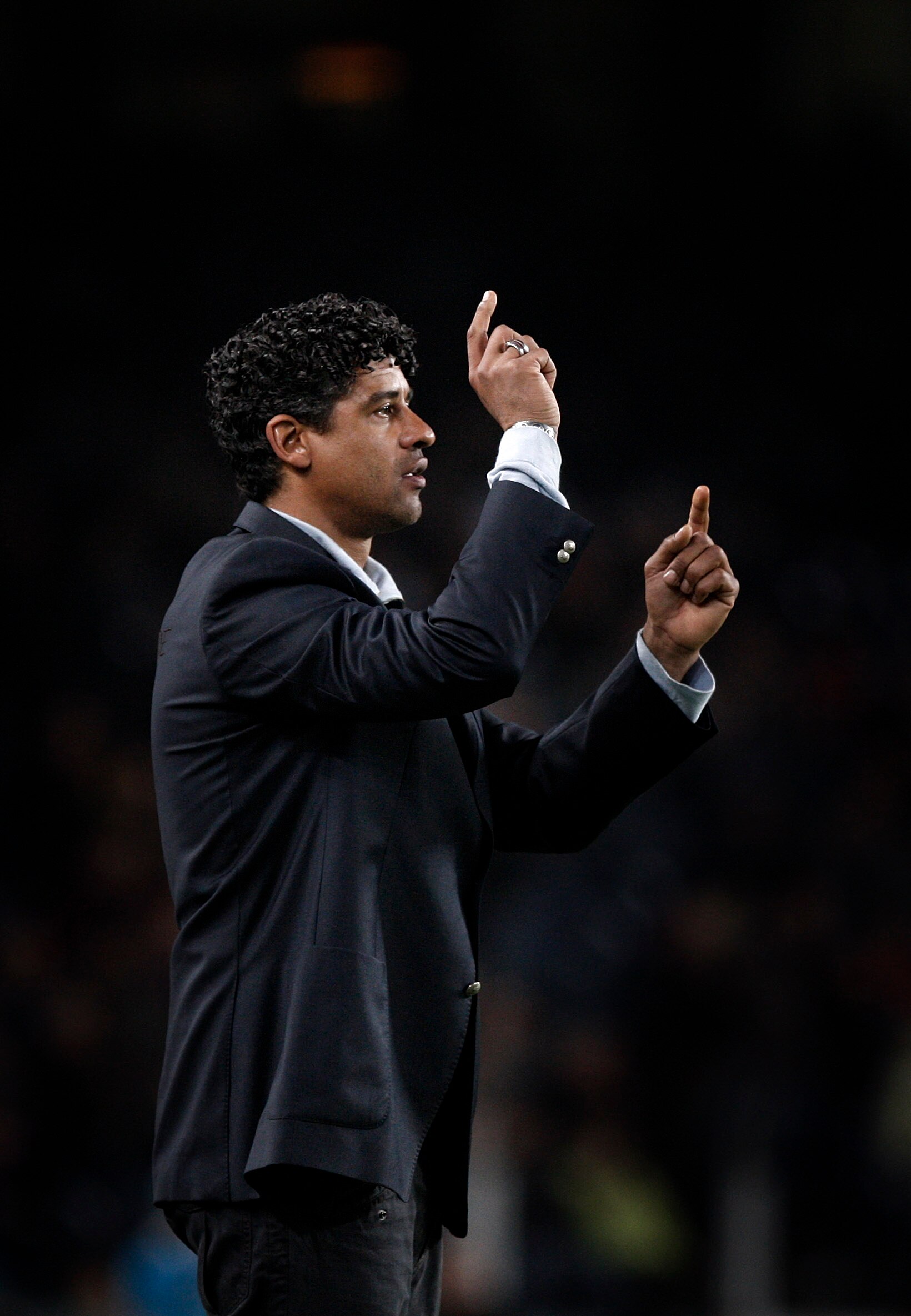 BARCELONA, SPAIN - APRIL 06:  Coach Frank Rijkaard gestures to his players during the La Liga match between Barcelona and Getafe at the Camp Nou Stadium on April 6, 2008 in Barcelona, Spain. The match ended in a 0-0 draw.  (Photo by Jasper Juinen/Getty Im