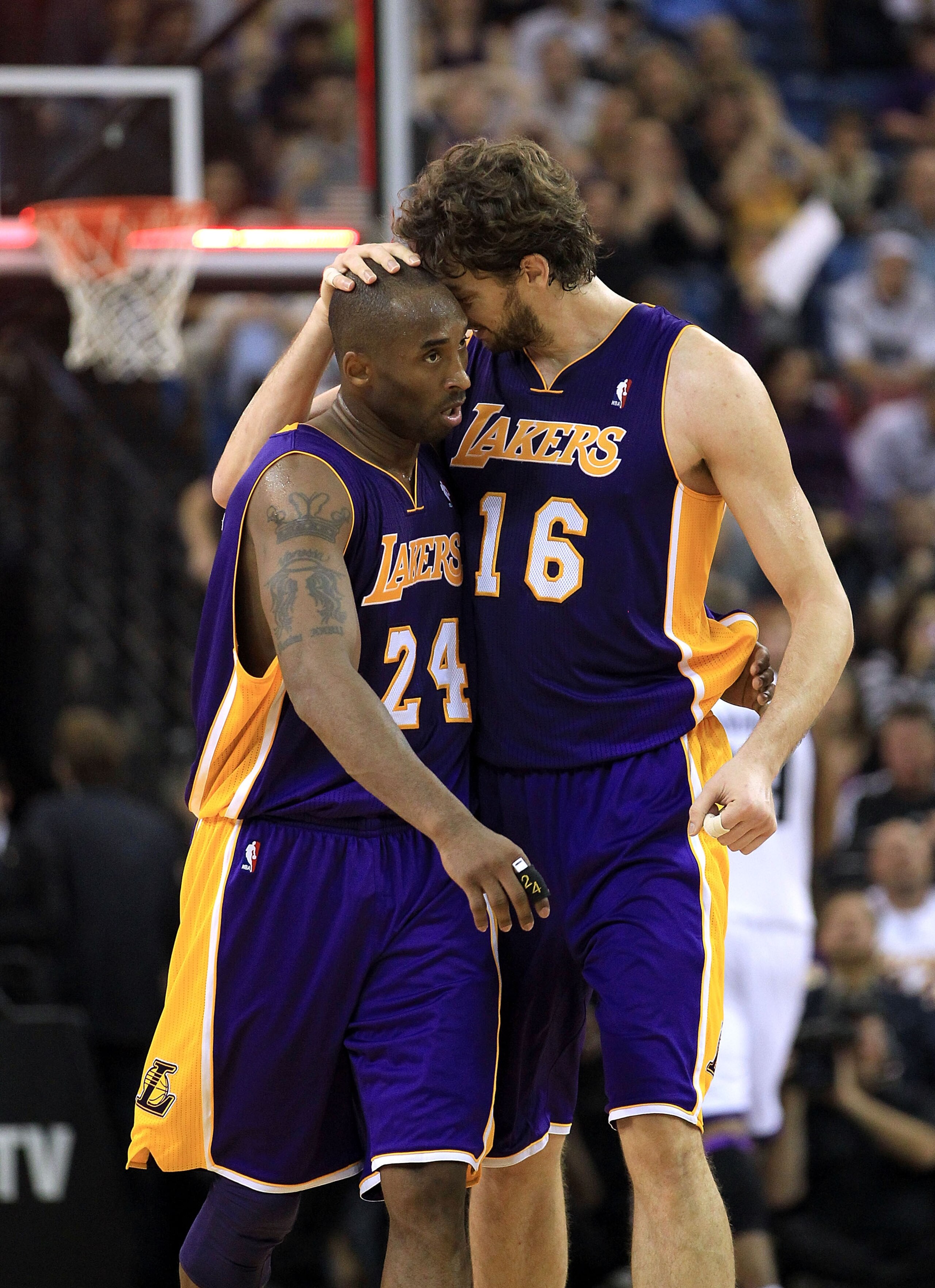 SACRAMENTO, CA - NOVEMBER 03:  Kobe Bryant #24 and Pau Gasol #16 of the Los Angeles Lakers walk off the court for halftime after the Lakers made a last second shot against the Sacramento Kings at ARCO Arena on November 3, 2010 in Sacramento, California.  