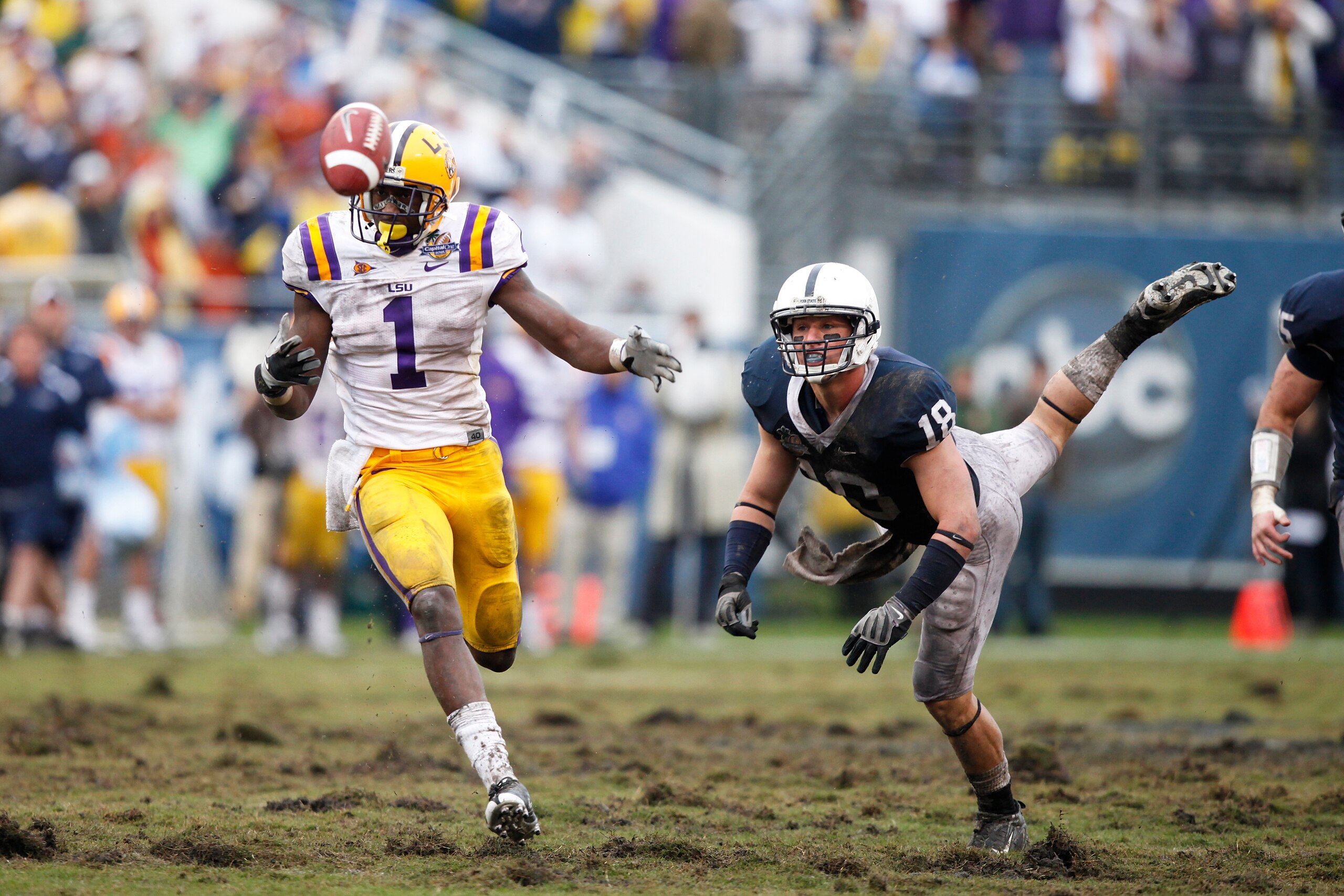 ORLANDO, FL - JANUARY 1: Nick Sukay #18 of the Penn State Nittany Lions defends a pass intended for Brandon LaFell #1 of the LSU Tigers during the 2010 Capital One Bowl at the Florida Citrus Bowl Stadium on January 1, 2010 in Orlando, Florida. Penn State
