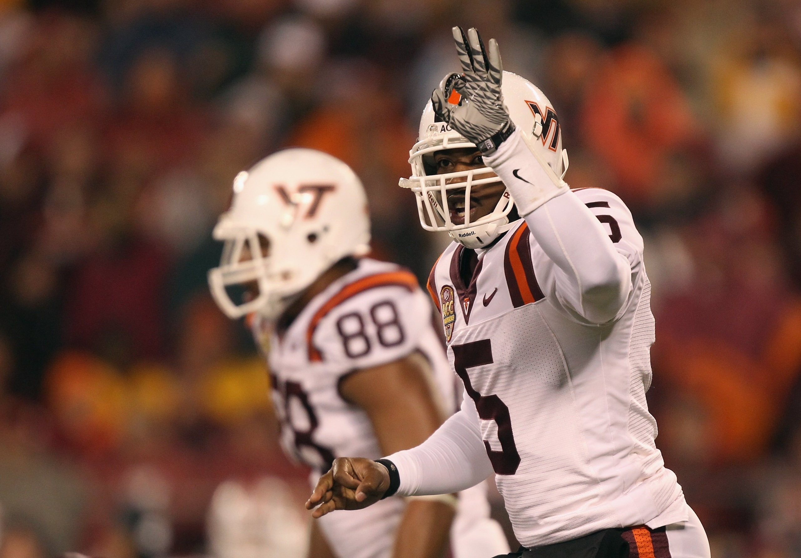 CHARLOTTE, NC - DECEMBER 04:  Tyrod Taylor #5 of the Virginia Tech Hokies calls a play against the Florida State Seminoles during their game at Bank of America Stadium on December 4, 2010 in Charlotte, North Carolina.  (Photo by Streeter Lecka/Getty Image