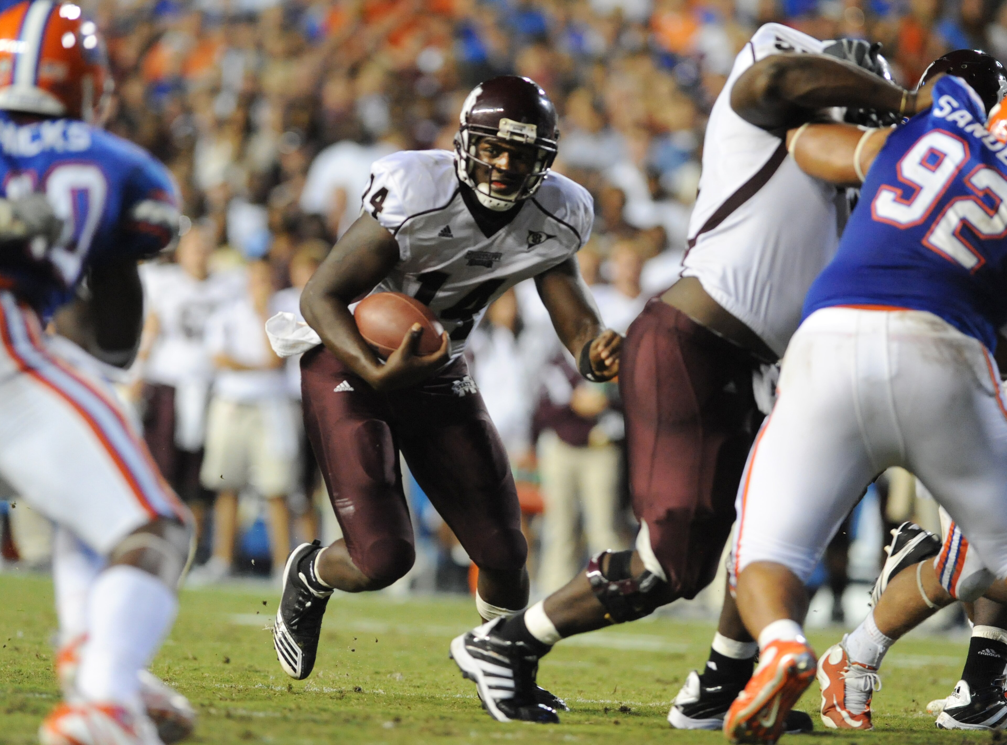 GAINESVILLE, FL - OCTOBER 16: Quarterback Chris Relf #14 of the Mississippi State Bulldogs runs upfield against the Florida Gators October 16, 2010 Ben Hill Griffin Stadium at Gainesville, Florida. (Photo by Al Messerschmidt/Getty Images) GAINESVILLE, FL - OCTOBER 16: Quarterback Chris Relf #14 of the Mississippi State Bulldogs runs upfield against the Florida Gators October 16, 2010 Ben Hill Griffin Stadium at Gainesville, Florida. (Photo by Al Messerschmidt/Getty Images)