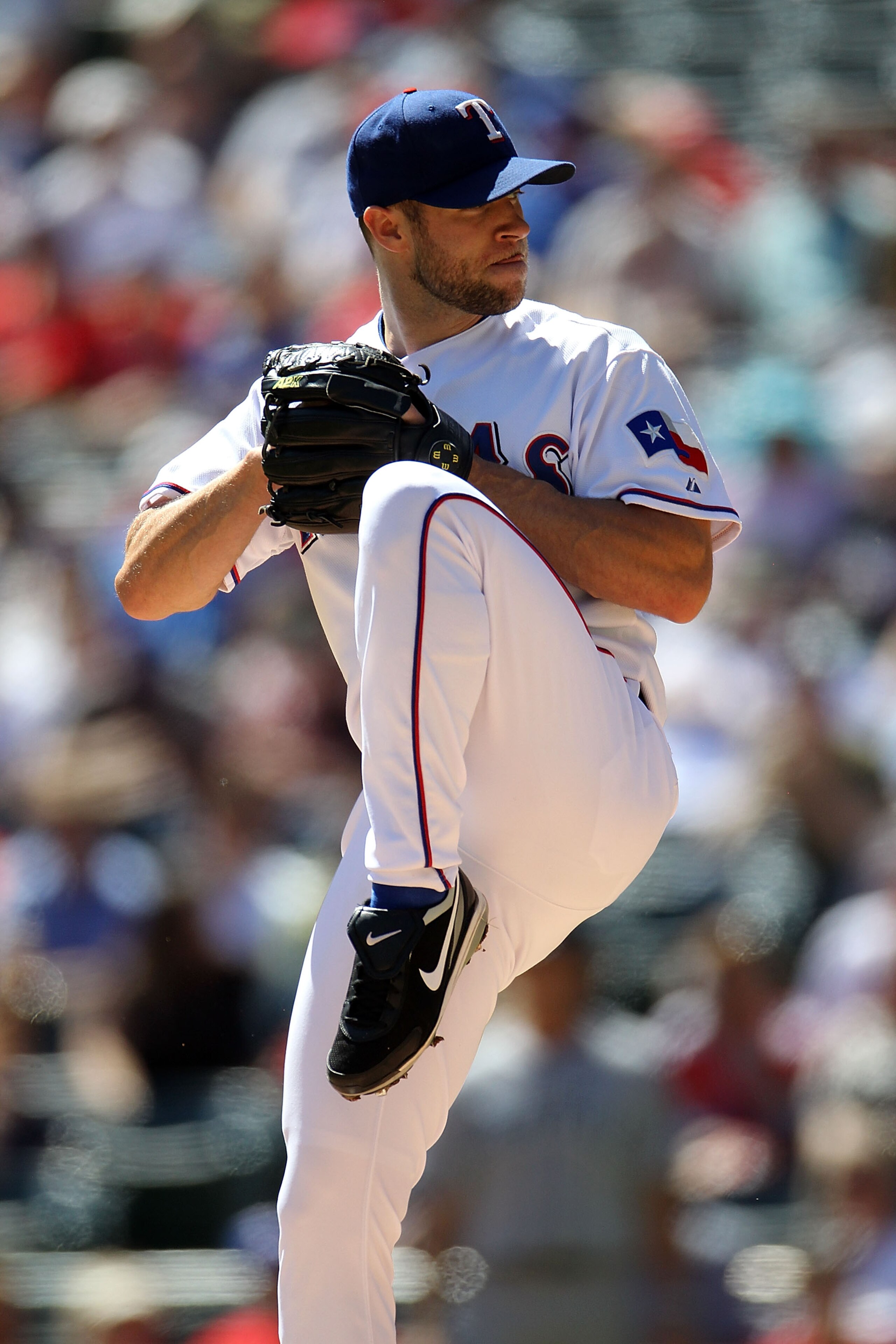 ARLINGTON, TX - SEPTEMBER 29:  Pitcher Rich Harden #40 of the Texas Rangers throws against the Seattle Mariners at Rangers Ballpark in Arlington on September 29, 2010 in Arlington, Texas.  (Photo by Ronald Martinez/Getty Images)