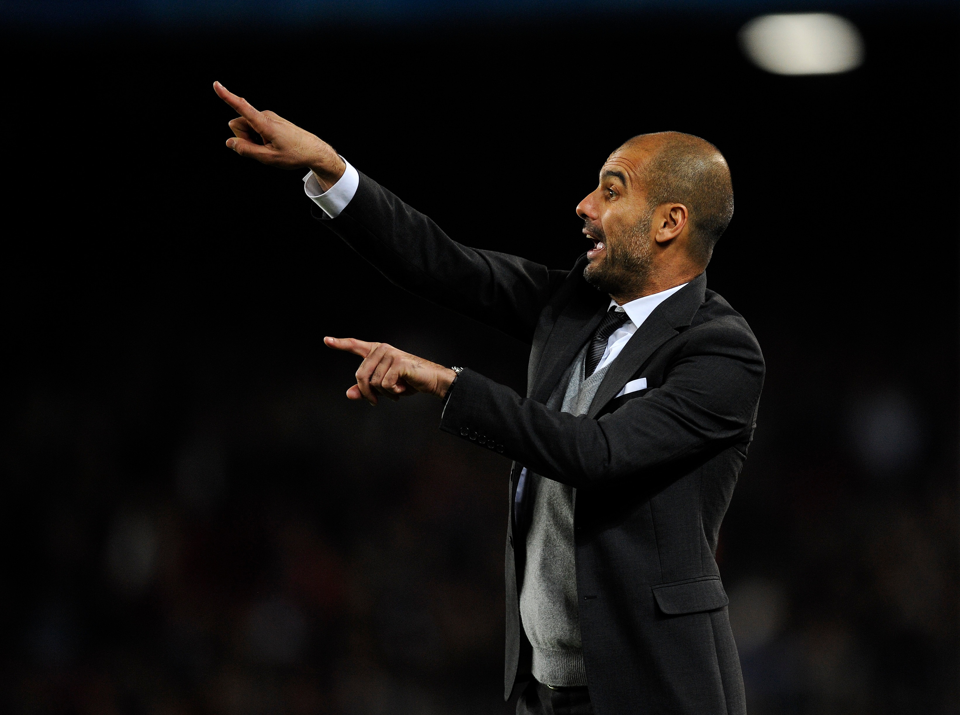 BARCELONA, SPAIN - OCTOBER 20:  Head coach Josep Guardiola of Barcelona reacts during the UEFA Champions League group D match between Barcelona and FC Copenhagen at the Camp nou stadium on October 20, 2010 in Barcelona, Spain. Barcelona won the match 2-0.