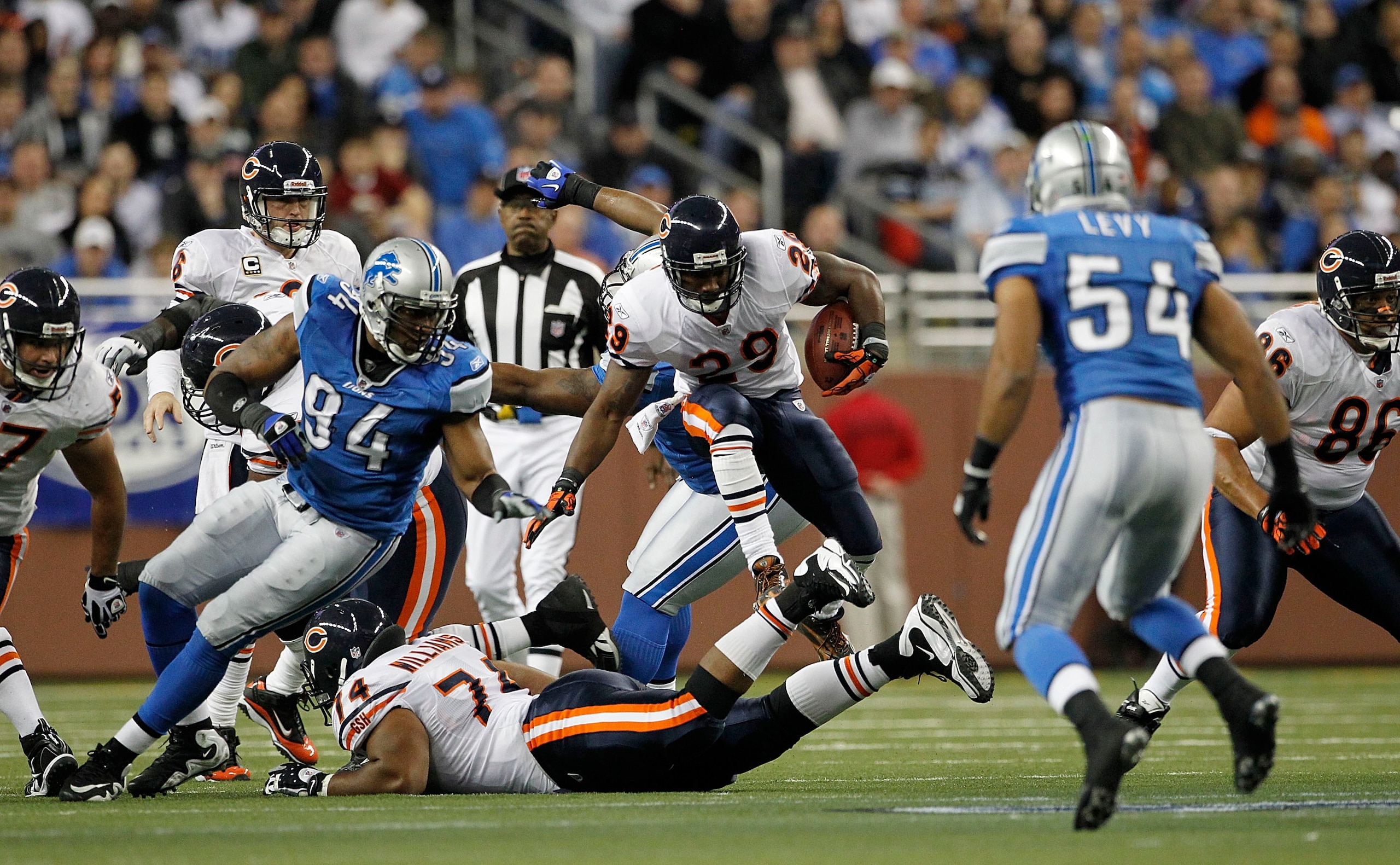 DETROIT - DECEMBER 05: Chester Taylor #29 of the Chicago Bears runs for a first down during the second quarter of the game against the Detroit Lions at Ford Field on December 5, 2010 in Detroit, Michigan.  (Photo by Leon Halip/Getty Images)