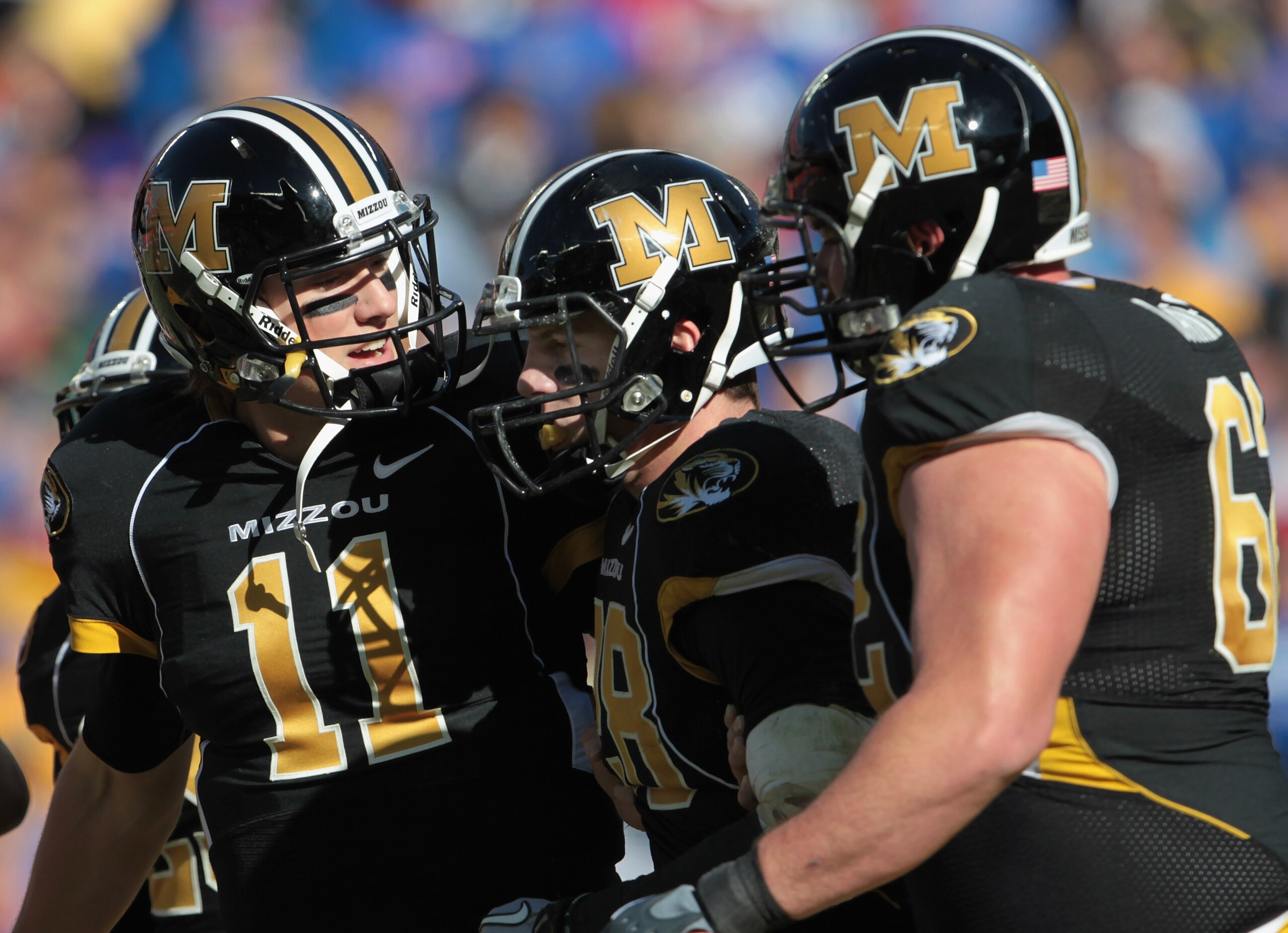 KANSAS CITY, MO - NOVEMBER 27:  Quarterback Blaine Gabbert #11 of the Missouri Tigers congratulates receiver T.J. Moe #28 after a touchdown during the game against the Kansas Jayhawks on November 27, 2010 at Arrowhead Stadium in Kansas City, Missouri.  (P