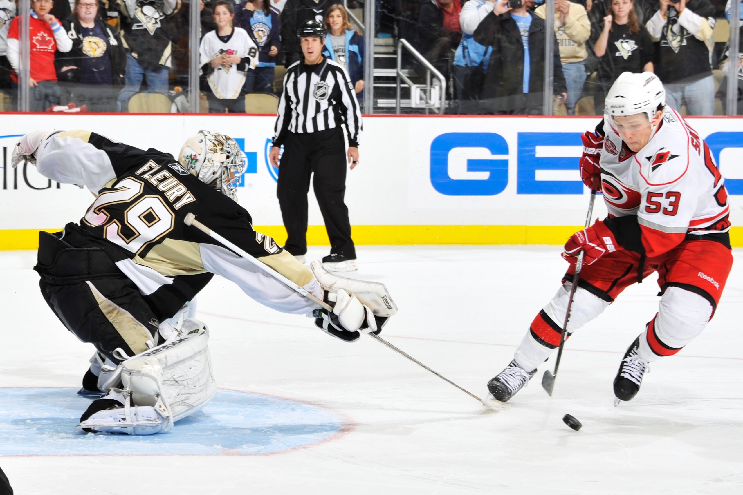PITTSBURGH - NOVEMBER 19:  Goaltender Marc-Andre Fleury #29 of the Pittsburgh Penguins attempts a poke check on Jeff Skinner #53 of the Carolina Hurricanes during the shootout on November 19, 2010 at Consol Energy Center in Pittsburgh, Pennsylvania. Pitts
