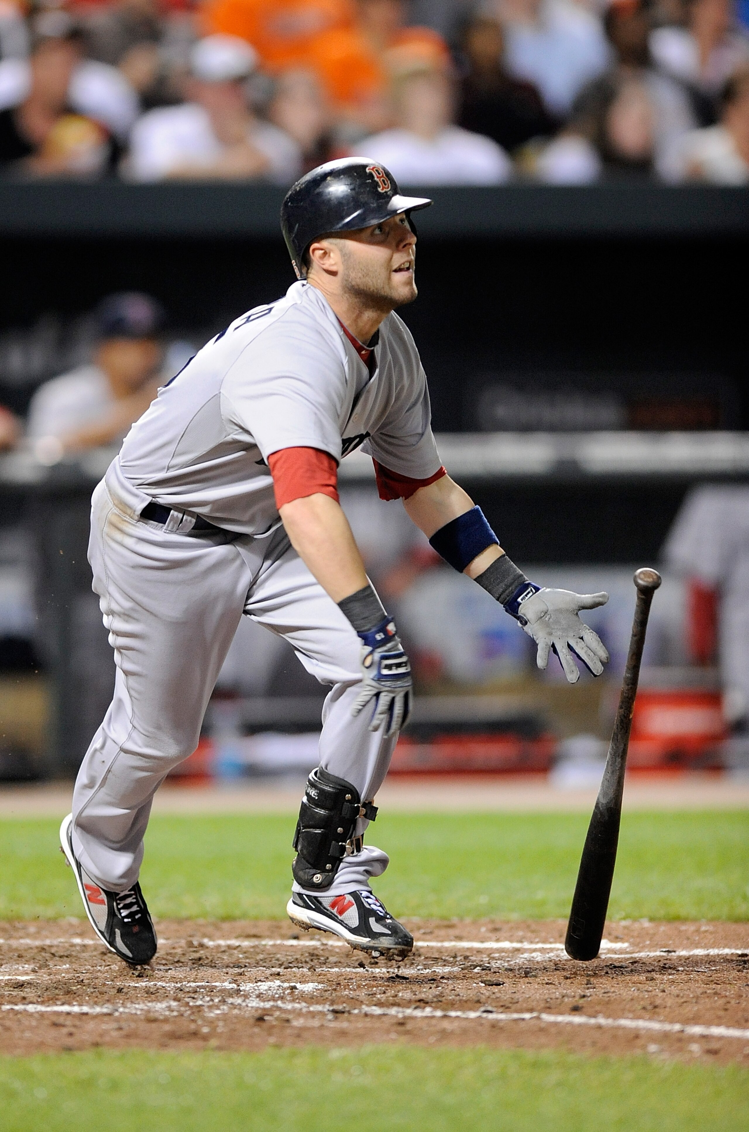 BALTIMORE - APRIL 30:  Dustin Pedroia #15 of the Boston Red Sox hits a home run in the sixth inning against the Baltimore Orioles at Camden Yards on April 30, 2010 in Baltimore, Maryland.  (Photo by Greg Fiume/Getty Images)