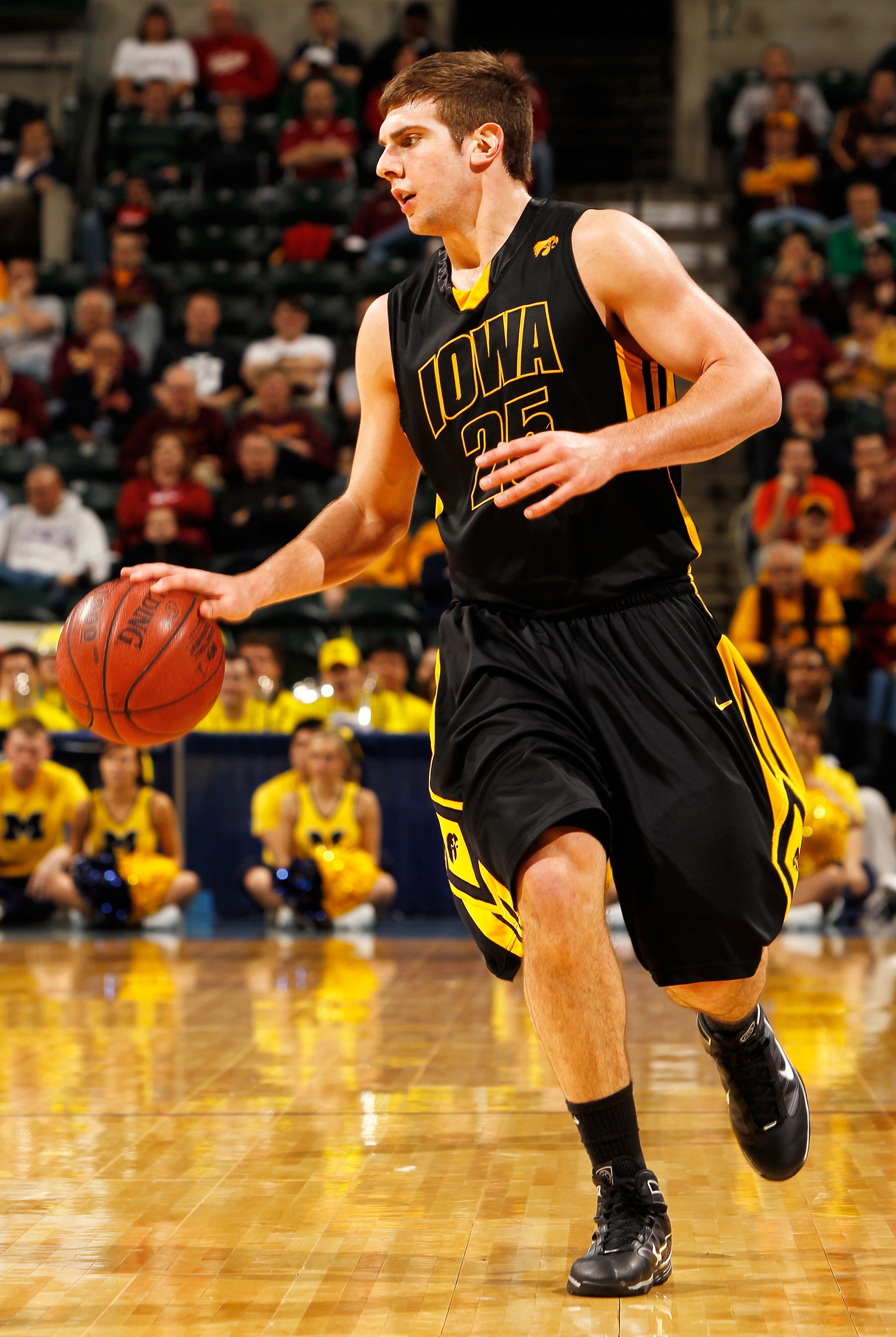 INDIANAPOLIS - MARCH 11:  Forward Eric May #25 of the Iowa Hawkeyes drives with the ball against the Michigan Wolverines during the first round of the Big Ten Men's Basketball Tournament at Conseco Fieldhouse on March 11, 2010 in Indianapolis, Indiana.  (