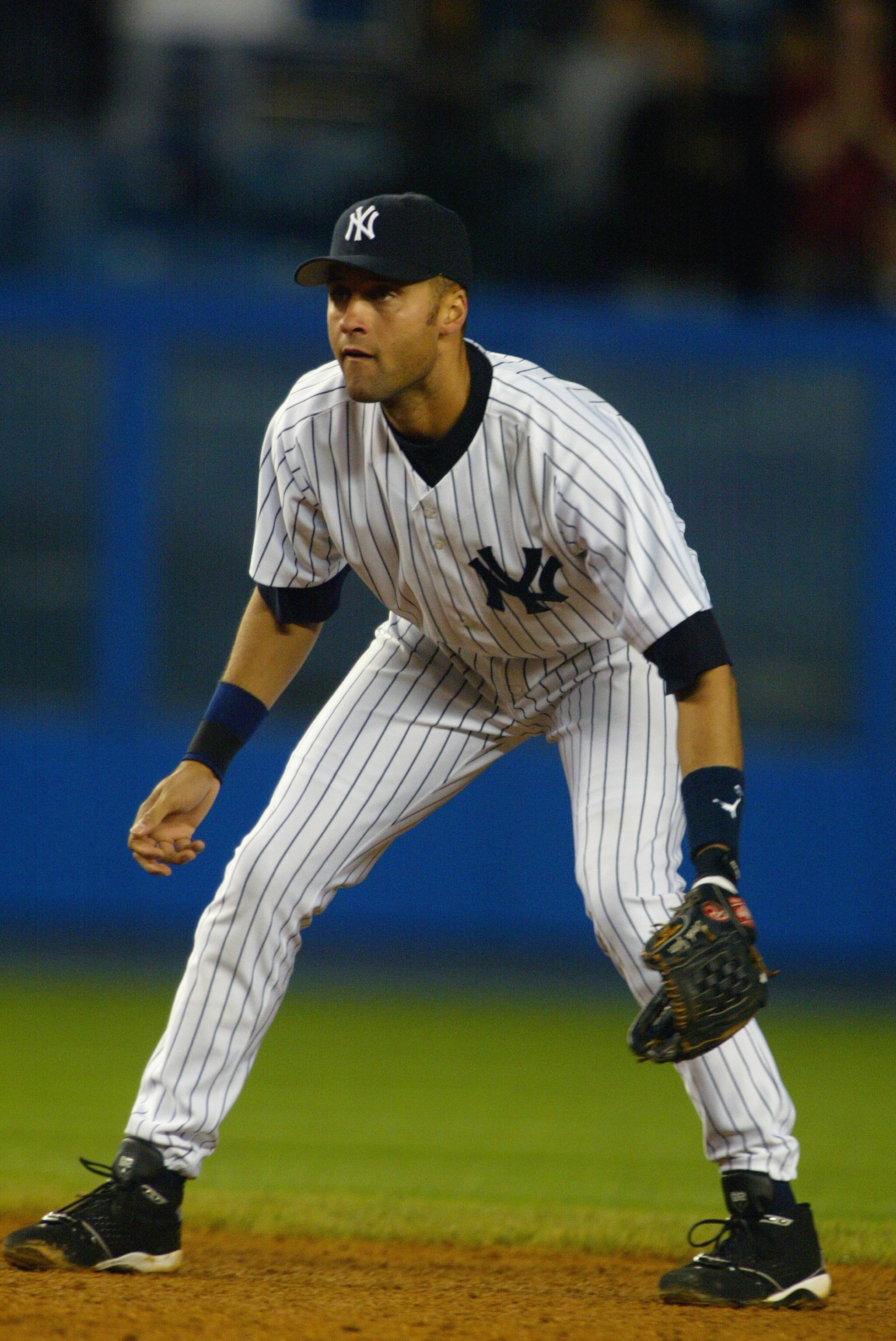 BRONX, NY - APRIL 29:  Derek Jeter #2 of the New York Yankees gets ready at short stop during the game against the Oakland A's on April 29, 2004 at Yankee Stadium in the Bronx, New York. The Yankees defeated the Athletics 7-5.  (Photo by Al Bello/Getty Im