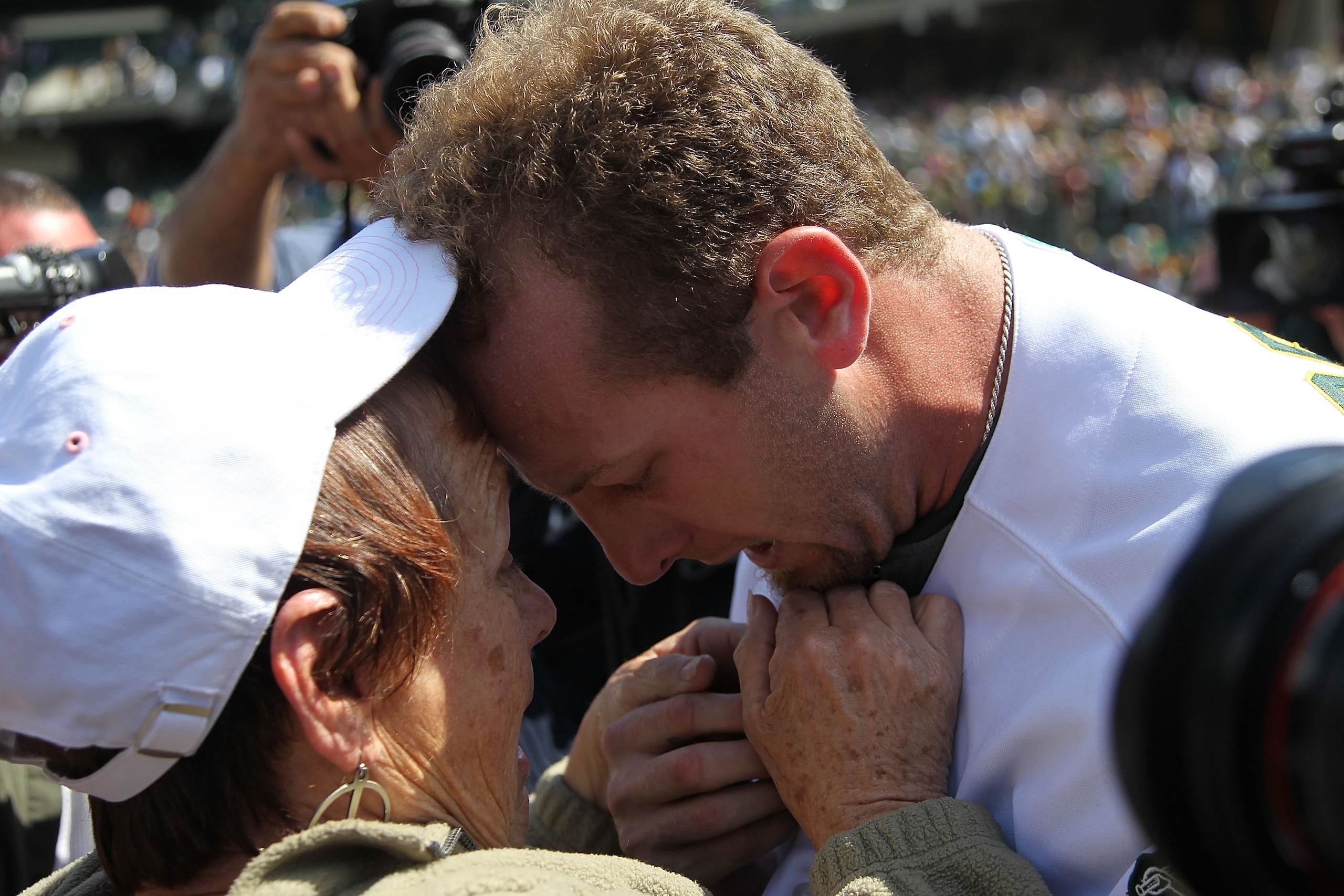OAKLAND, CA - MAY 09:  Dallas Braden #51 of the Oakland Athletics celebrates after pitching a perfect game against the Tampa Bay Rays with his grandmother Peggy Lindsey during an MLB game at the Oakland-Alameda County Coliseum on May 9, 2010 in Oakland, C