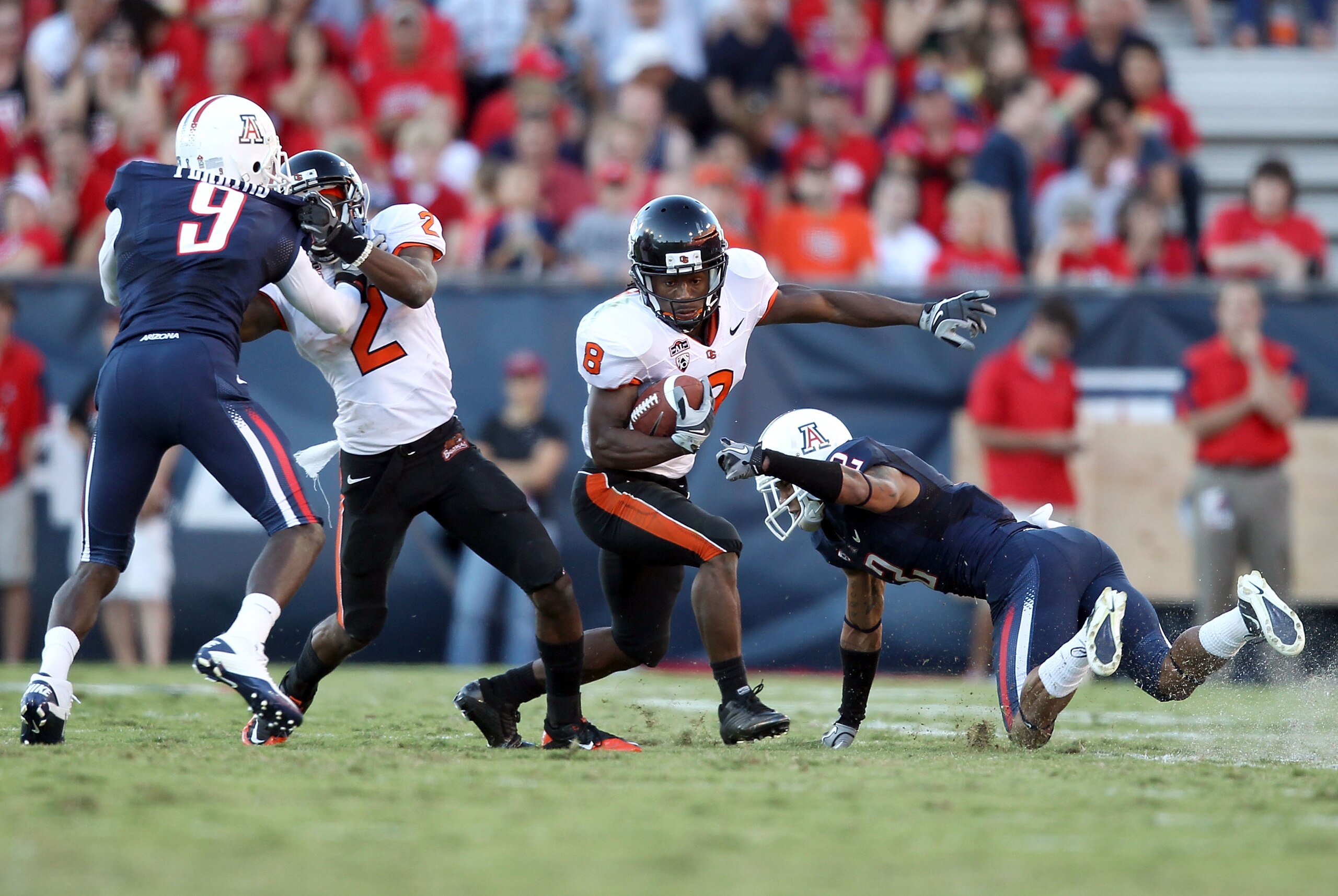 TUCSON, AZ - OCTOBER 09:  Wide receiver James Rodgers #8 of the Oregon State Beavers runs with the football during the college football game against the Arizona Wildcats at Arizona Stadium on October 9, 2010 in Tucson, Arizona. The Beavers defeated the Wi