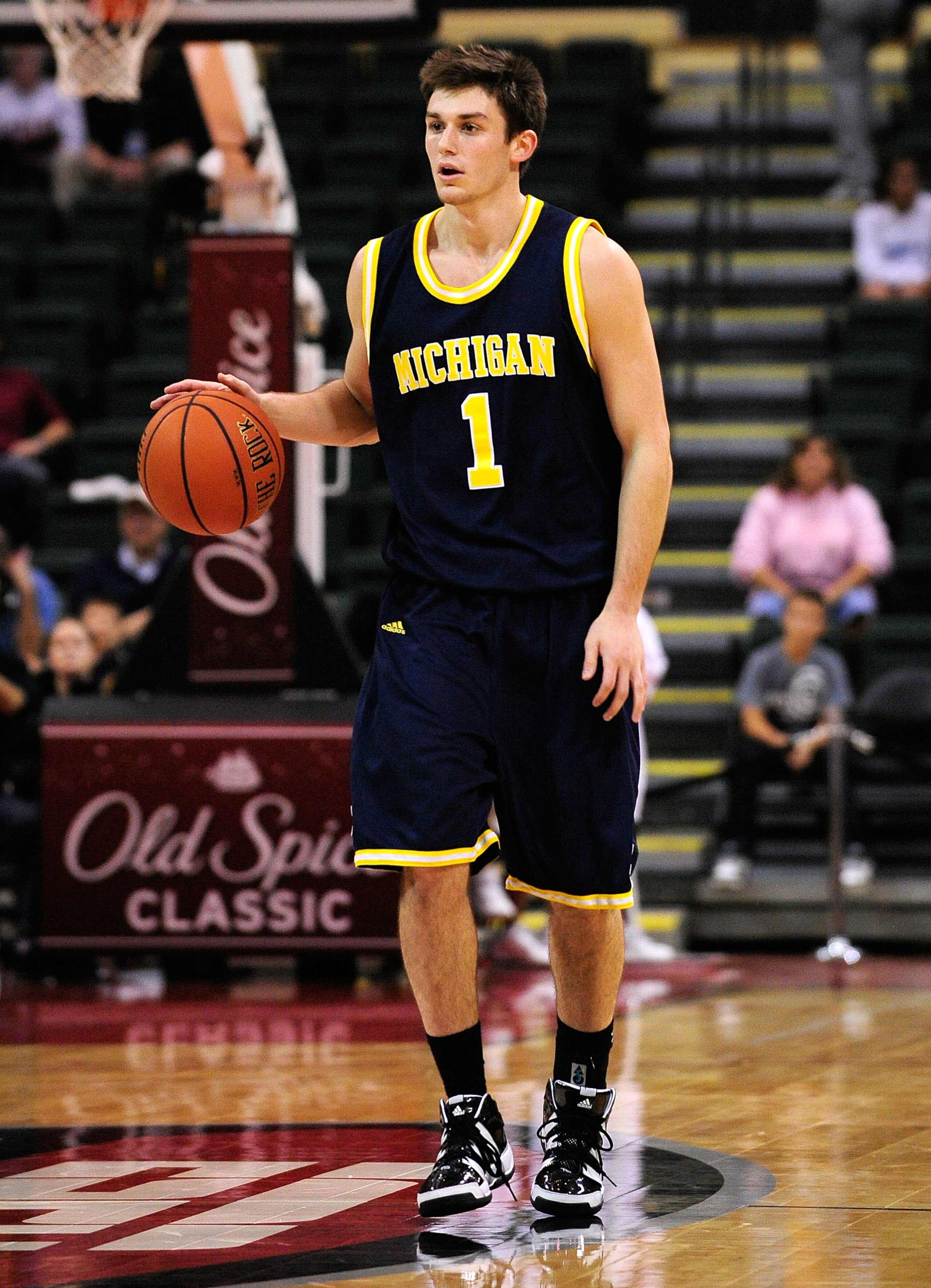 ORLANDO, FL - NOVEMBER 27:  Stu Douglas #1 of the Michigan Wolverines looks to pass against the Marquette Golden Eagles during the Old Spice Classic at Disney's Milk House on November 27, 2009 in Orlando, Florida. Marquette defeated Michigan 79-65.  (Phot