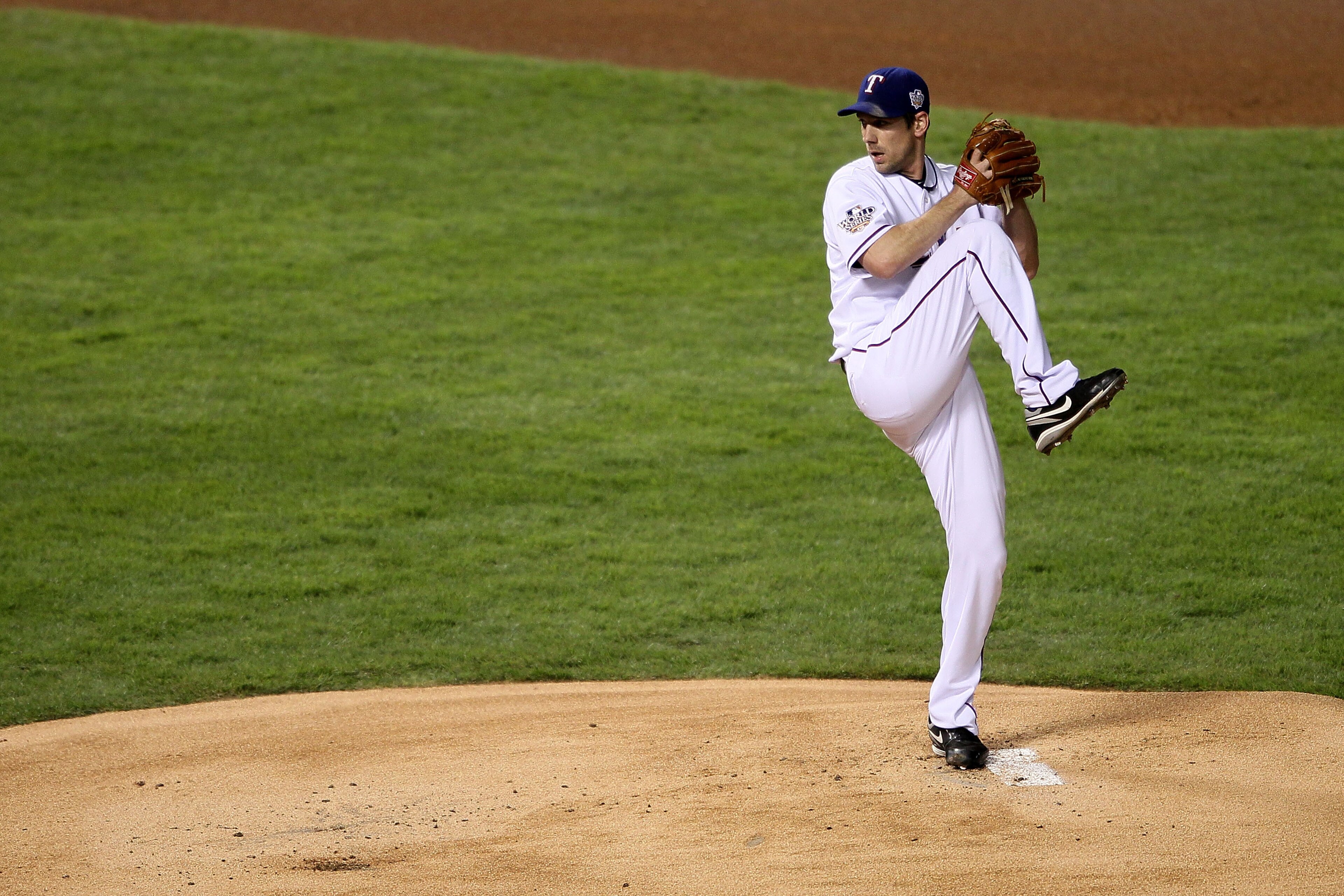 ARLINGTON, TX - NOVEMBER 01: Cliff Lee #33 of the Texas Rangers pitches against the San Francisco Giants in Game Five of the 2010 MLB World Series at Rangers Ballpark in Arlington on November 1, 2010 in Arlington, Texas. (Photo by Elsa/Getty Images) ARLINGTON, TX - NOVEMBER 01: Cliff Lee #33 of the Texas Rangers pitches against the San Francisco Giants in Game Five of the 2010 MLB World Series at Rangers Ballpark in Arlington on November 1, 2010 in Arlington, Texas. (Photo by Elsa/Getty Images)