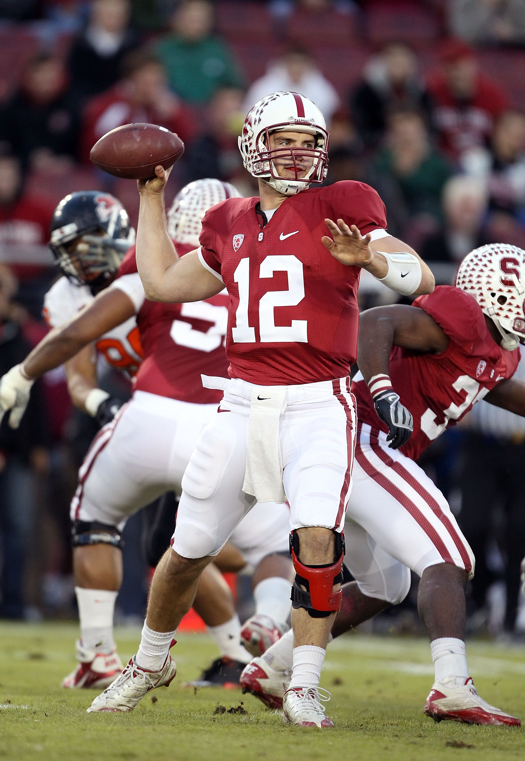 PALO ALTO, CA - NOVEMBER 27:  Andrew Luck #12 of the Stanford Cardinal passes the ball against the Oregon State Beavers at Stanford Stadium on November 27, 2010 in Palo Alto, California.  (Photo by Ezra Shaw/Getty Images)