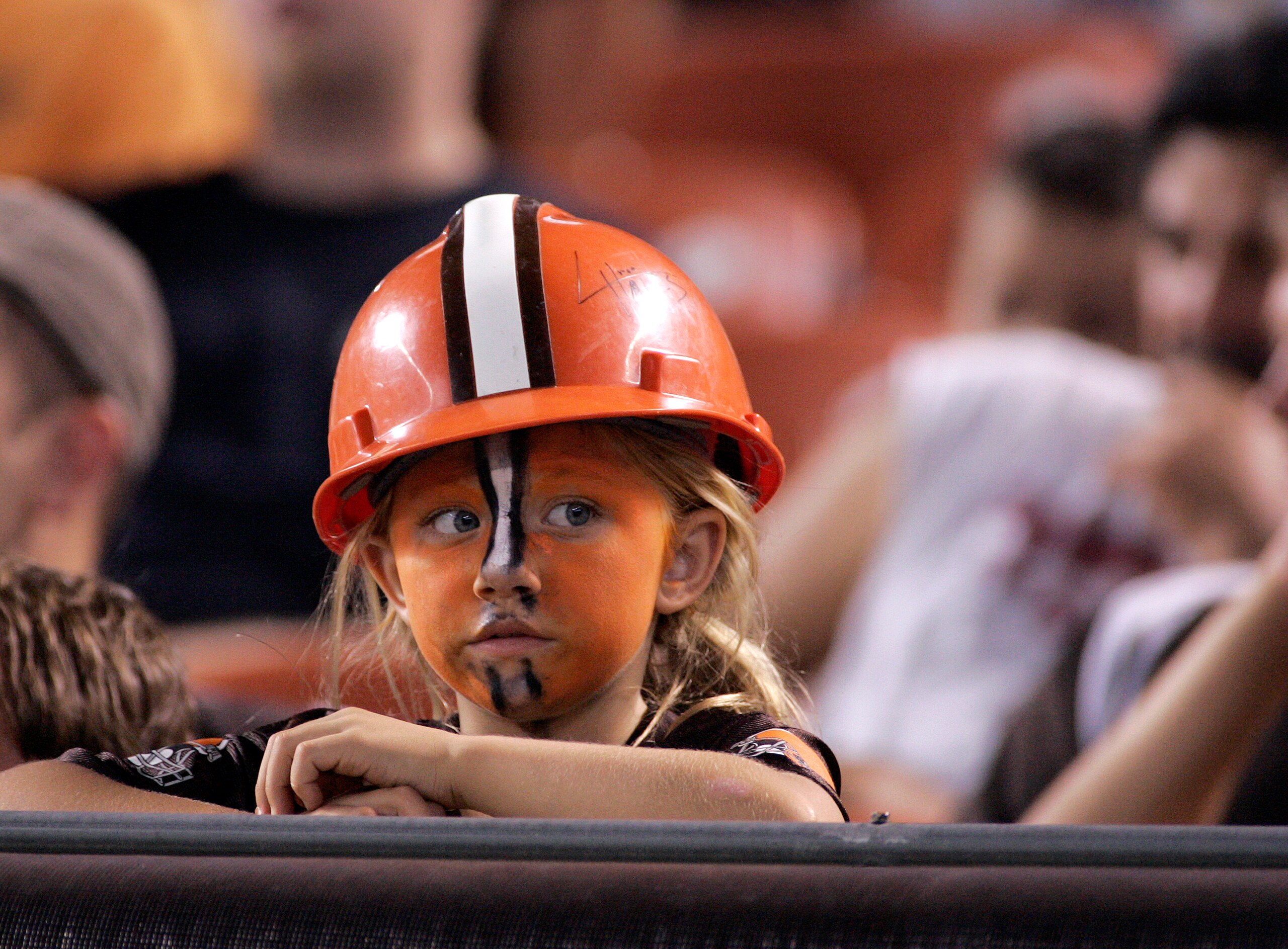 CLEVELAND - SEPTEMBER 2:  A young Cleveland Browns fan looks on during the preseason game against the Chicago Bears on September 2, 2010 at Cleveland Browns Stadium in Cleveland, Ohio. The Browns defeated the Bears 13-10.  (Photo by Justin K. Aller/Getty