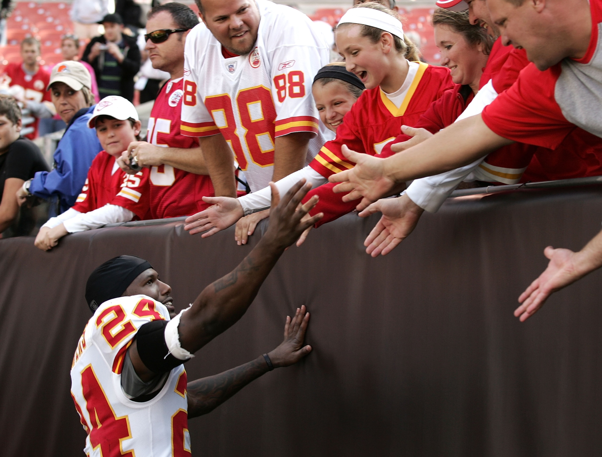 CLEVELAND - SEPTEMBER 19:  Cornerback Brandon Flowers #24 of the Kansas City Chiefs celebrates with fans after their game against the Cleveland Browns at Cleveland Browns Stadium on September 19, 2010 in Cleveland, Ohio.  (Photo by Matt Sullivan/Getty Ima