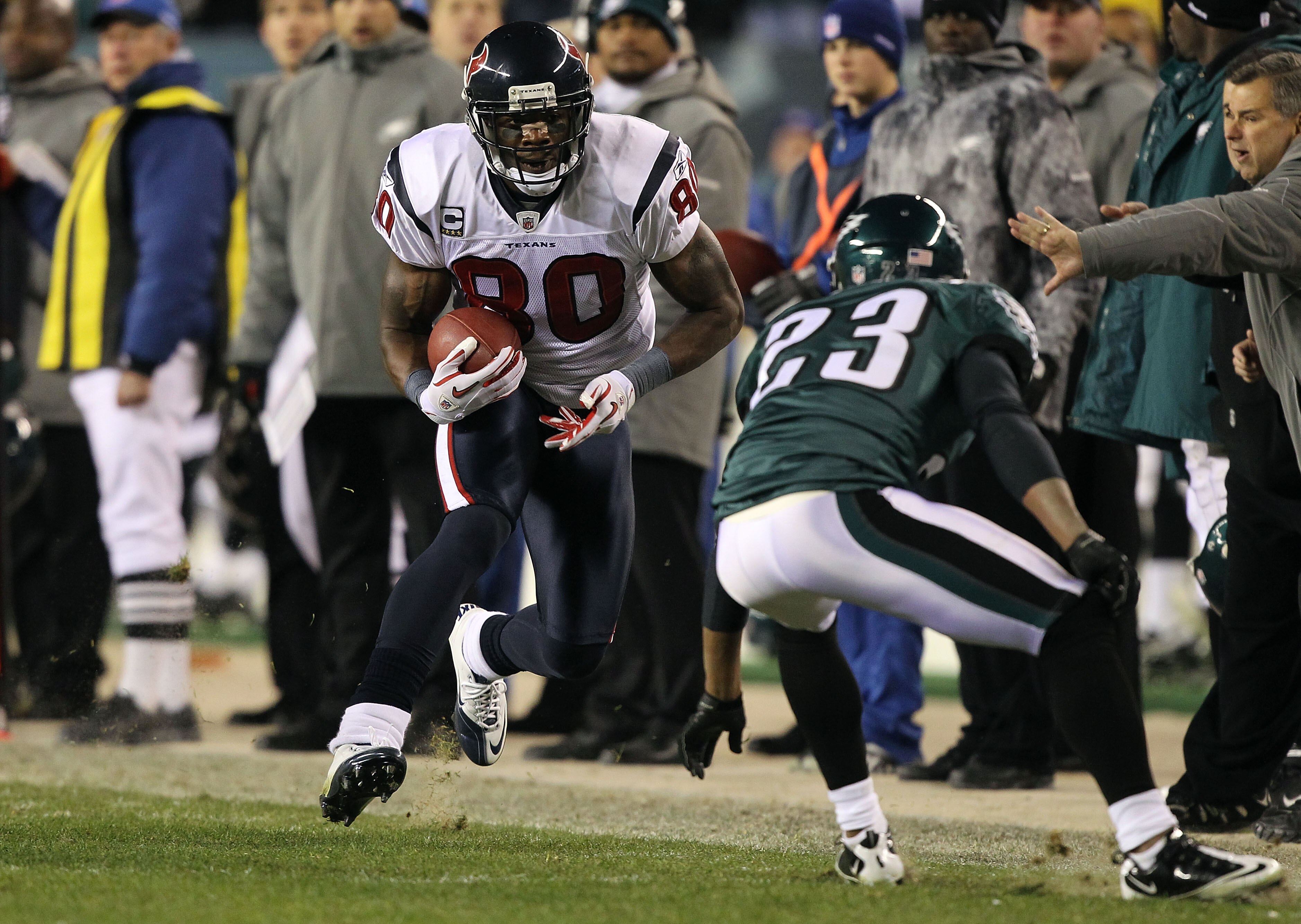 PHILADELPHIA, PA - DECEMBER 02:  Andre Johnson #80 of the Houston Texans runs for yards after the catch in the second half against Dimitri Patterson #23 of the Philadelphia Eagles at Lincoln Financial Field on December 2, 2010 in Philadelphia, Pennsylvani