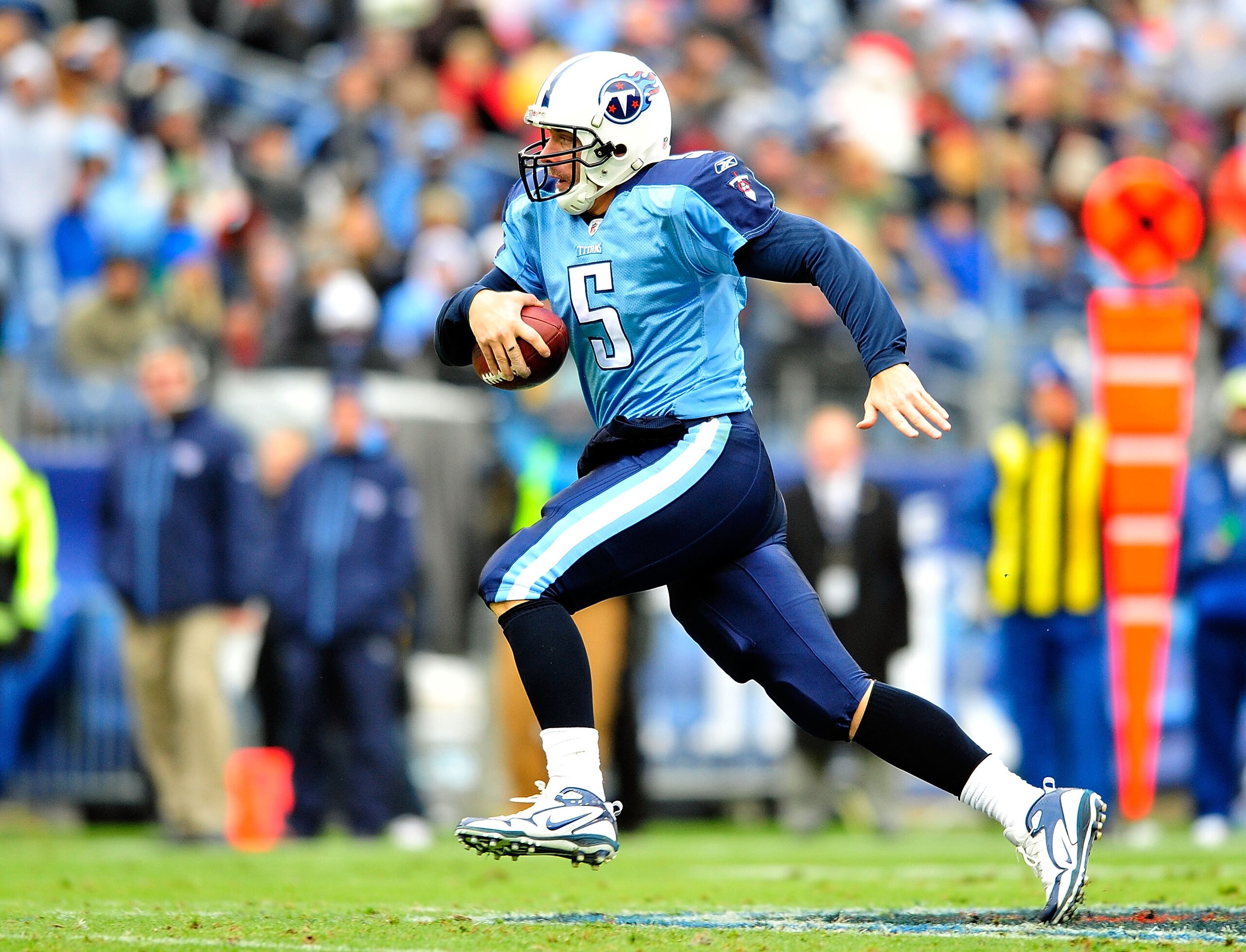 NASHVILLE, TN - DECEMBER 05:  Quarterback Kerry Collins #5 of the Tennessee Titans runs after being flushed out of the pocket by the Jacksonville Jaguars at LP Field on December 5, 2010 in Nashville, Tennessee. The Jaguars won 17-6. (Photo by Grant Halver