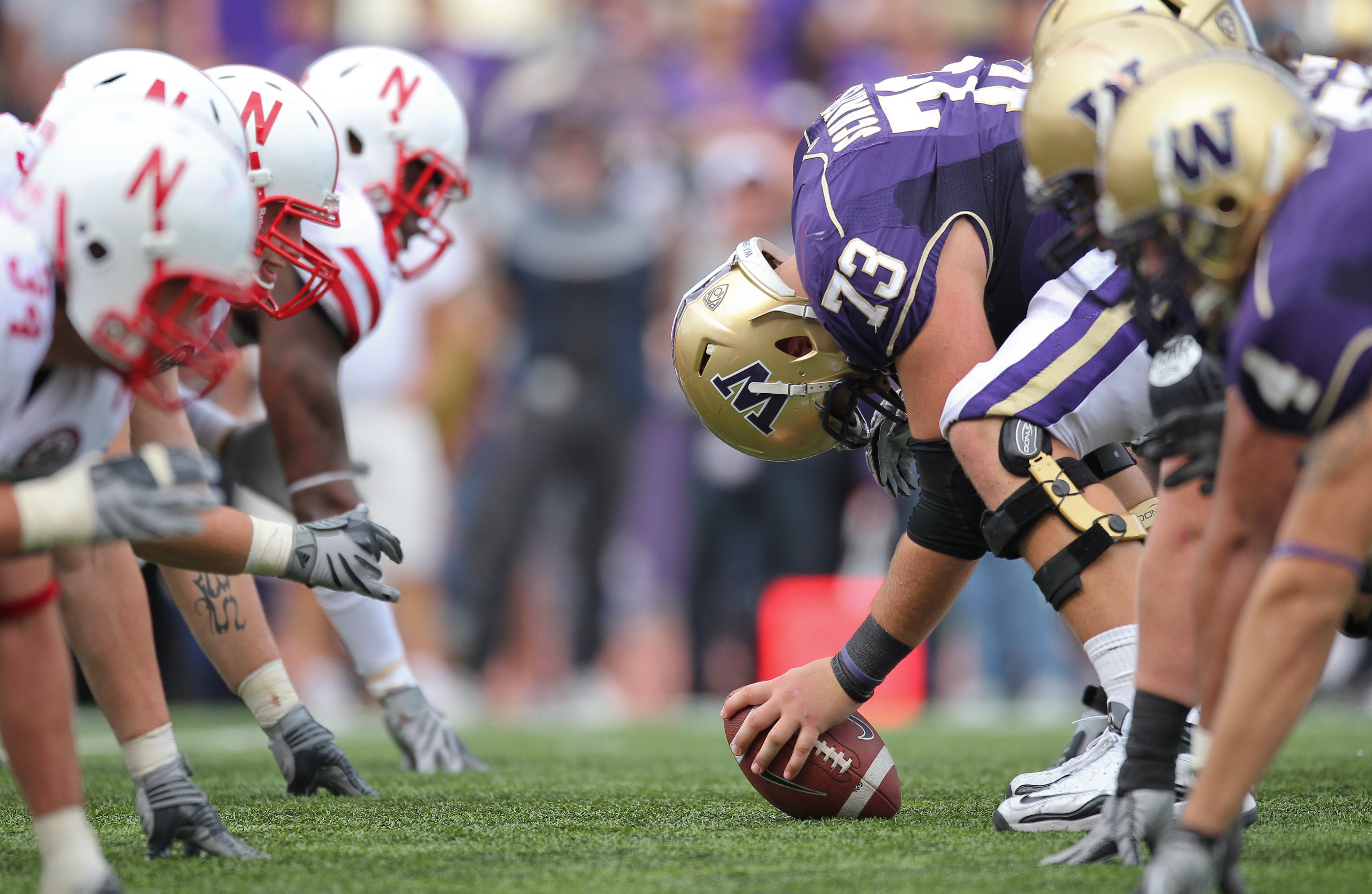 SEATTLE - SEPTEMBER 18: Center Drew Schaefer #73 of the Washington Huskies prepares to snap the ball against the Nebraska Cornhuskers on September 18, 2010 at Husky Stadium in Seattle, Washington. (Photo by Otto Greule Jr/Getty Images)