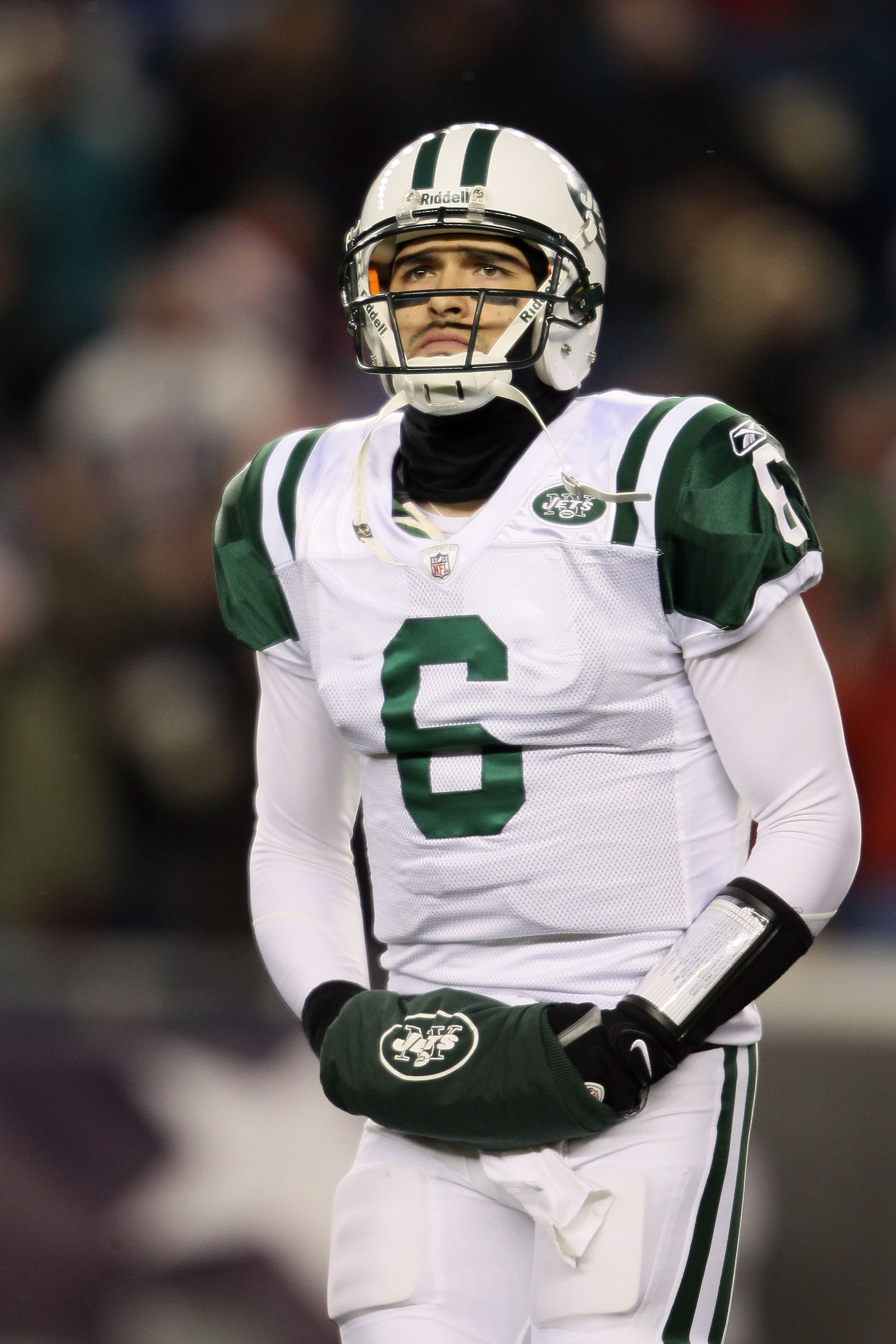 FOXBORO, MA - DECEMBER 06:  Mark Sanchez #6 of the New York Jets looks on against the New England Patriots at Gillette Stadium on December 6, 2010 in Foxboro, Massachusetts.  (Photo by Elsa/Getty Images)