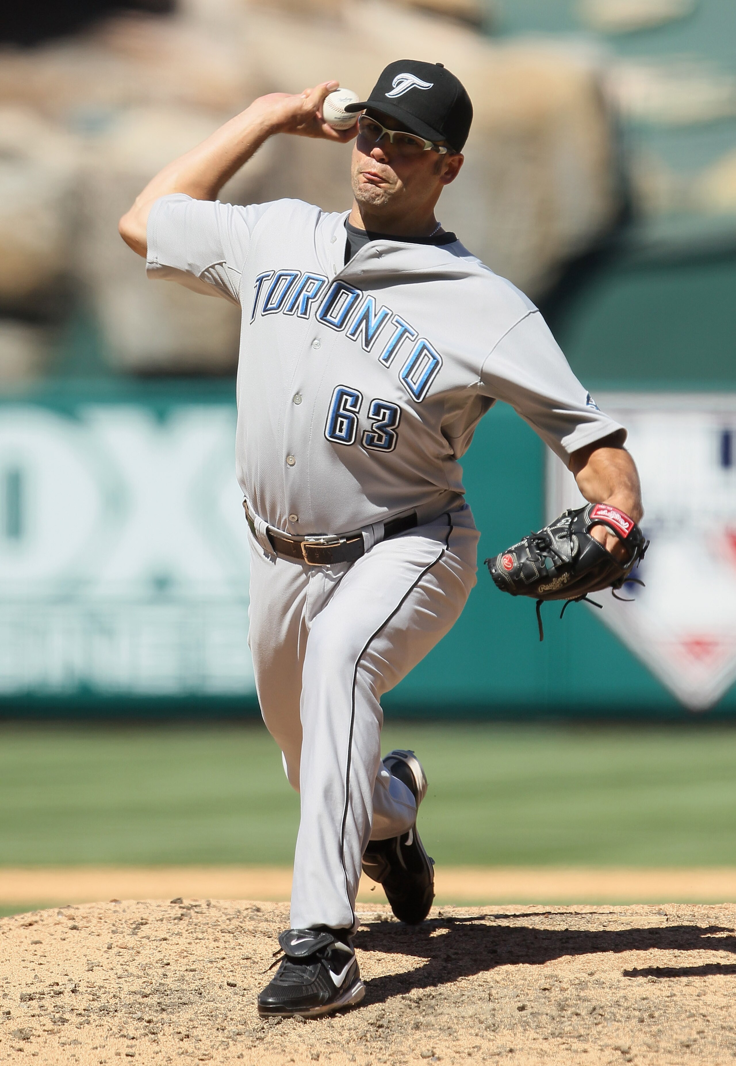 ANAHEIM, CA - AUGUST 15:  Kevin Gregg #63 of the Toronto Blue Jays pitches against the Los Angeles Angels of Anaheim in the ninth inning at Angel Stadium on August 15, 2010 in Anaheim, California. The Blue Jays defeated the Angels 4-1.  (Photo by Jeff Gro
