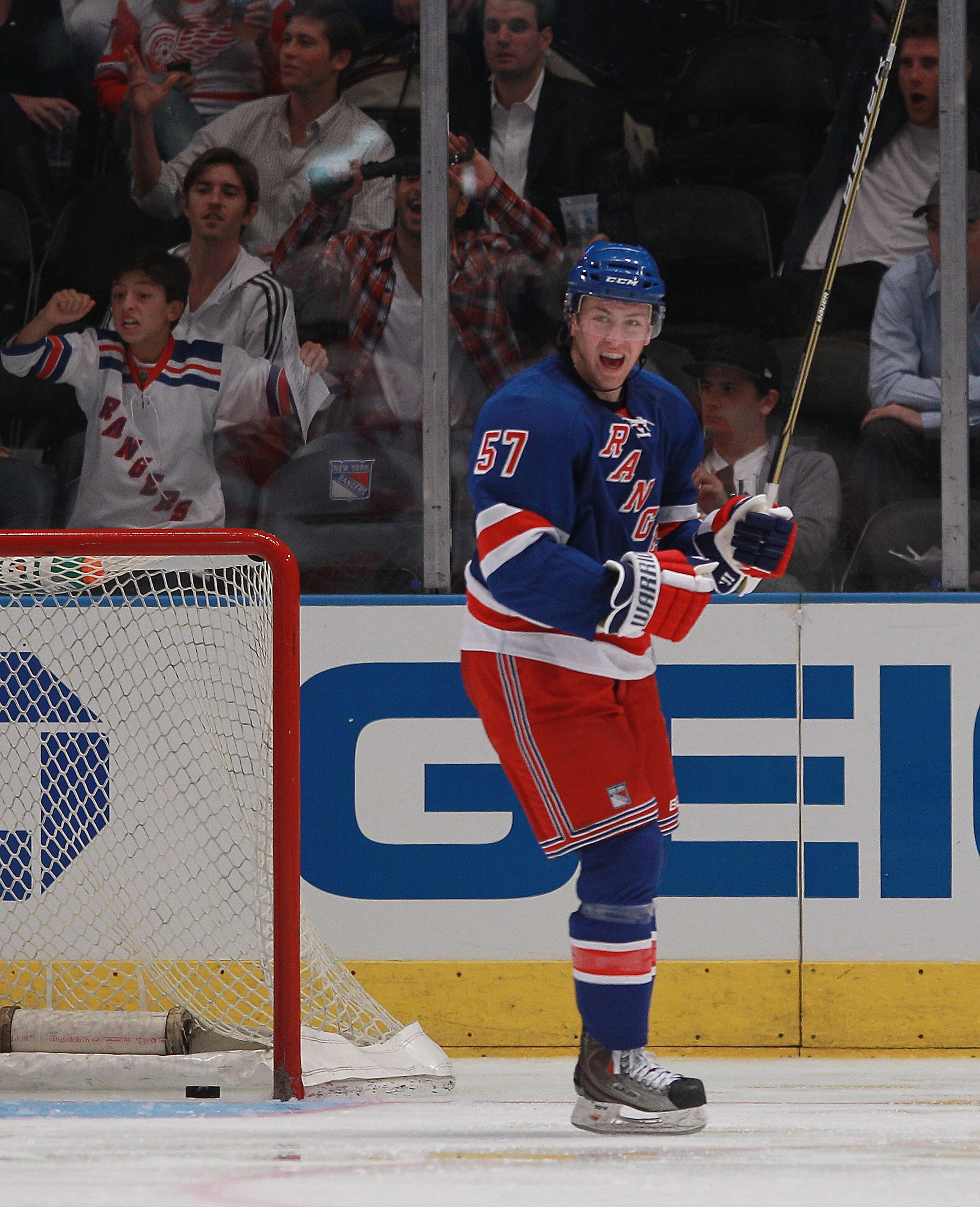 NEW YORK - SEPTEMBER 29:  Derek Stepan #57 of the New York Rangers scores a third period goal against the Detroit Red Wings at Madison Square Garden on September 29, 2010 in New York City.  The Rangers defeated the Red Wings 5-1.  (Photo by Bruce Bennett/