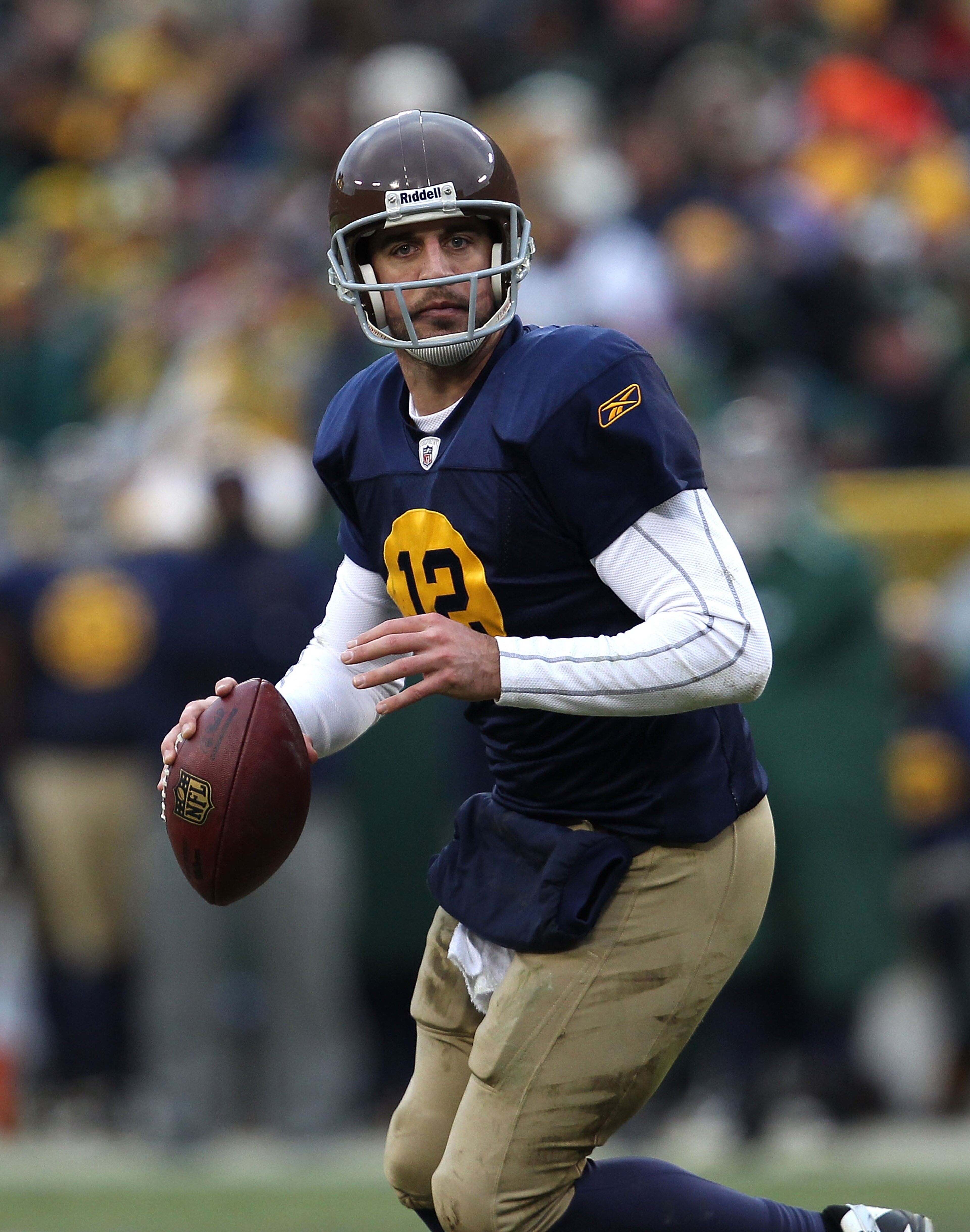 GREEN BAY, WI - DECEMBER 05: Aaron Rodgers #12 of the Green Bay Packers looks for a receiver against the San Francisco 49ers at Lambeau Field on December 5, 2010 in Green Bay, Wisconsin. The Packers defeated the 49ers 34-16. (Photo by Jonathan Daniel/Gett