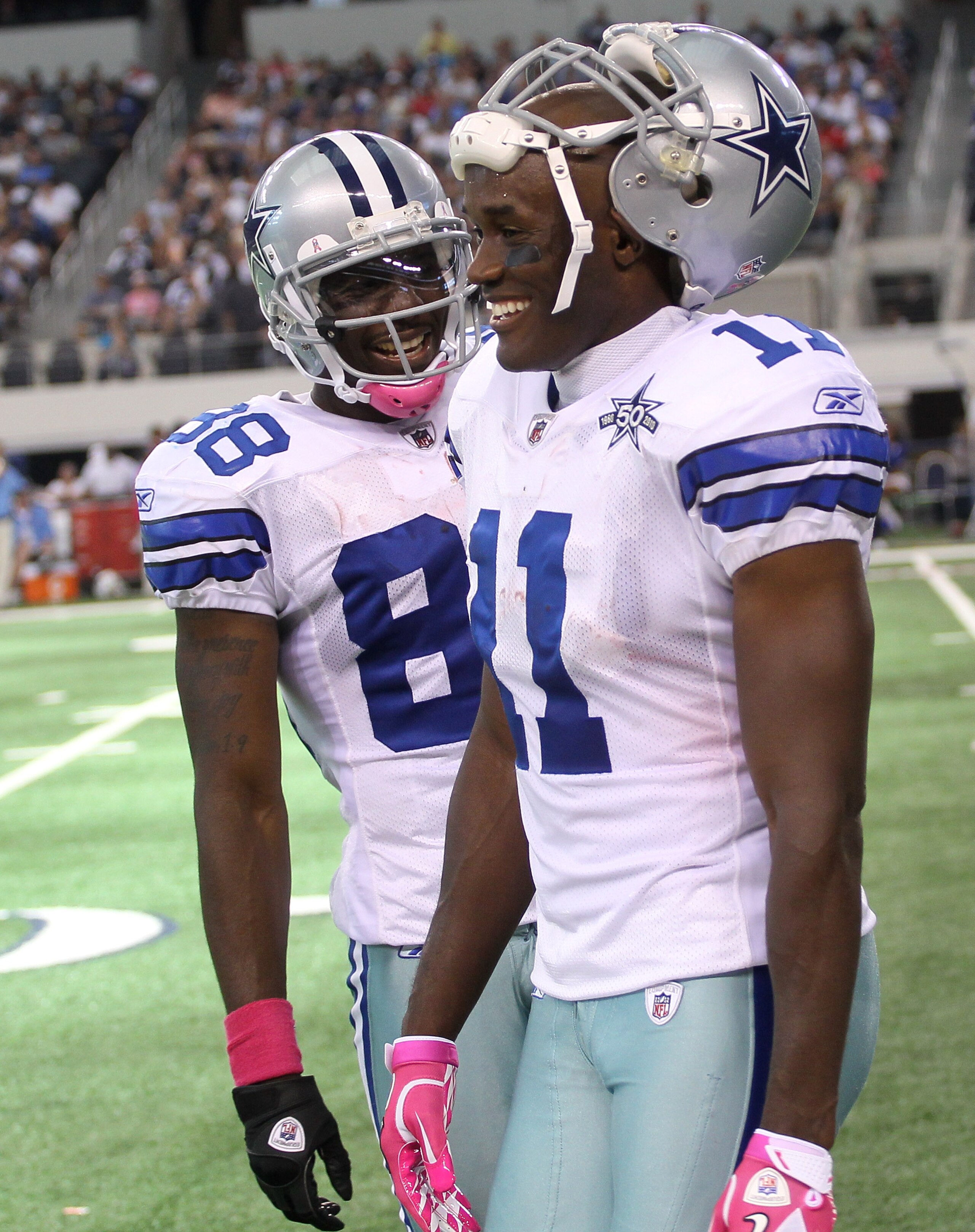 ARLINGTON, TX - OCTOBER 10:  Wide receivers Roy Williams #11 and Dez Bryant #88 of the Dallas Cowboys laugh during the game against the Tennessee Titans at Cowboys Stadium on October 10, 2010 in Arlington, Texas. The Titans won 34-27.  (Photo by Stephen D