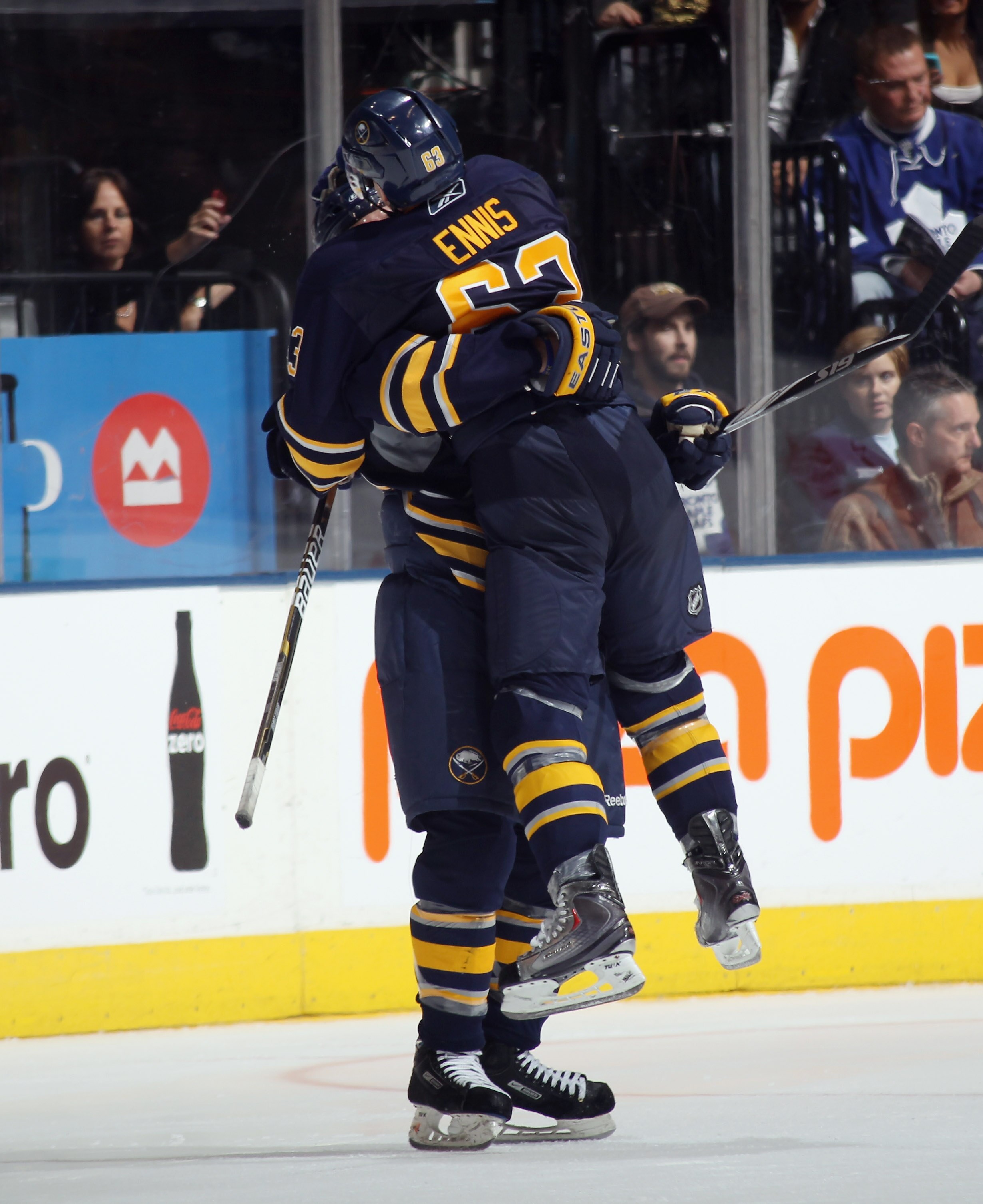TORONTO, ON - NOVEMBER 06:  Tyler Ennis #63 of the Buffalo Sabres scores the shoot out winner against Jean-Sebastien Giguere #35 of the Toronto Maple Leafs at the Air Canada Centre on November 6, 2010 in Toronto, Canada. The Sabres defeated the Maple Leaf