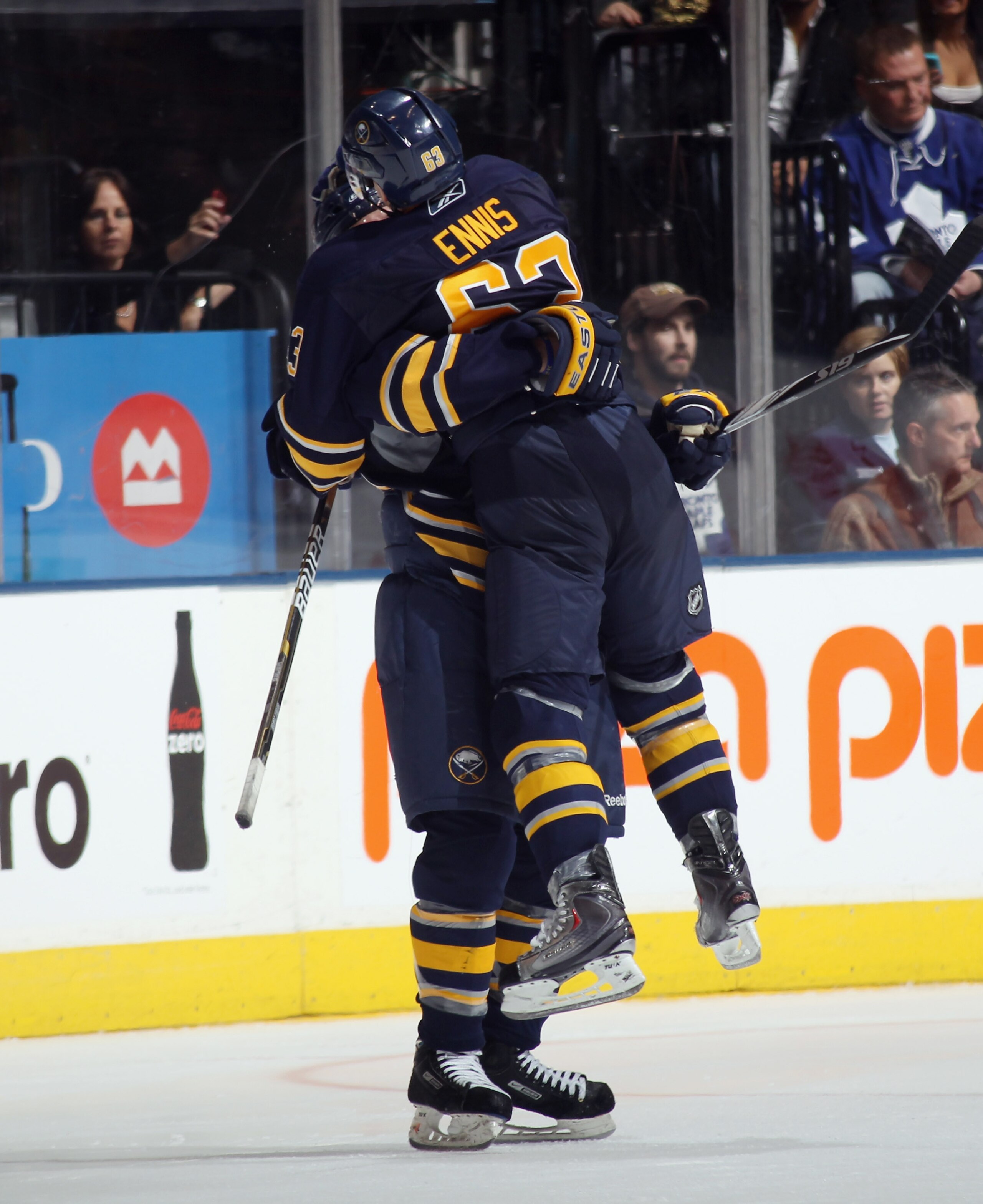 TORONTO, ON - NOVEMBER 06:  Tyler Ennis #63 of the Buffalo Sabres scores the shoot out winner against Jean-Sebastien Giguere #35 of the Toronto Maple Leafs at the Air Canada Centre on November 6, 2010 in Toronto, Canada. The Sabres defeated the Maple Leaf
