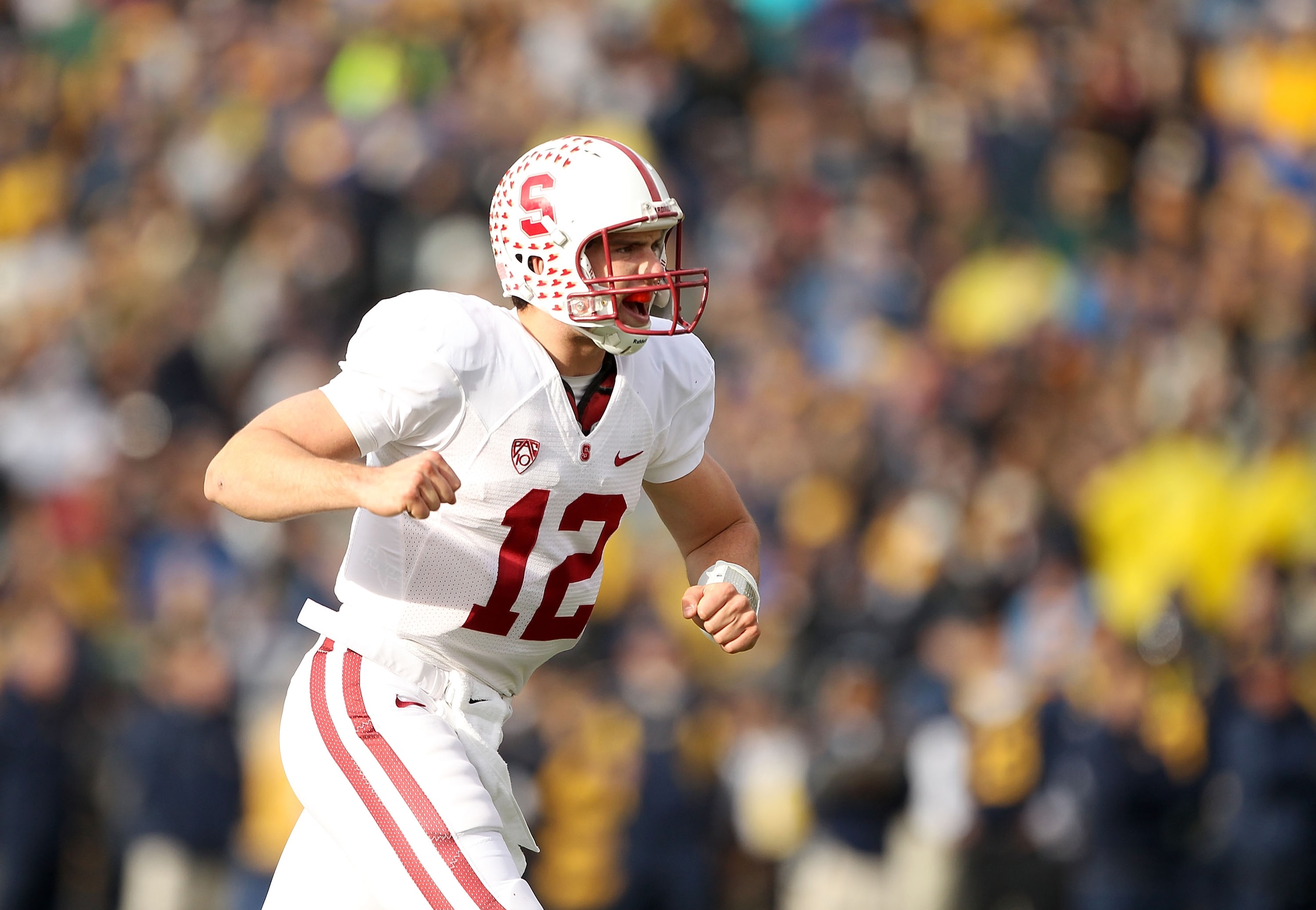 BERKELEY, CA - NOVEMBER 20:  Andrew Luck #12 of the Stanford Cardinal celebrates after the Cardinal scored a touchdown against the California Golden Bears at California Memorial Stadium on November 20, 2010 in Berkeley, California.  (Photo by Ezra Shaw/Ge