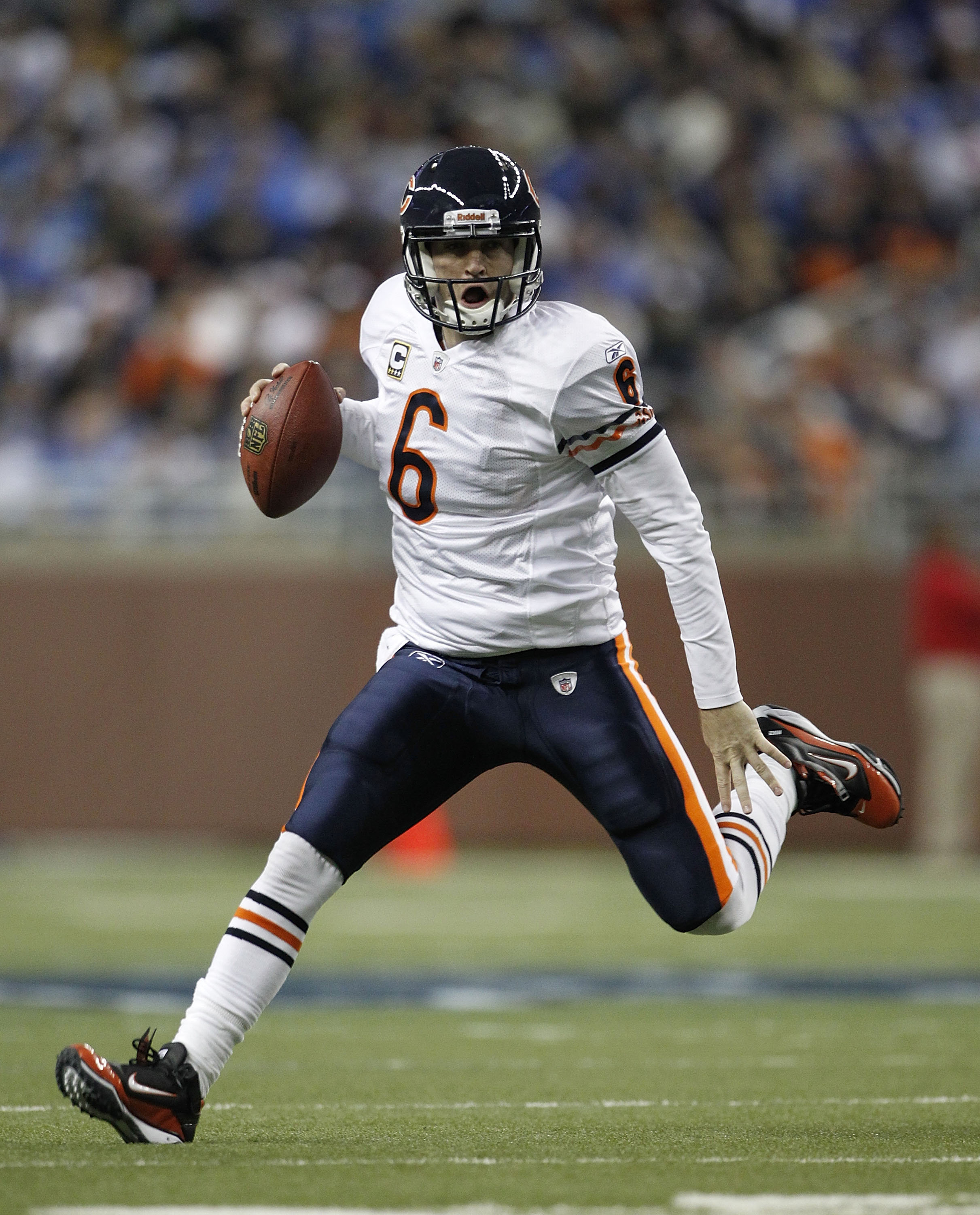 DETROIT - DECEMBER 05: Jay Cutler #6 of the Chicago Bears scrambles for a first down during the fourth quarter of the game against the Detroit Lions at Ford Field on December 5, 2010 in Detroit, Michigan. The Bears defeated the Lions 24-20.  (Photo by Leo
