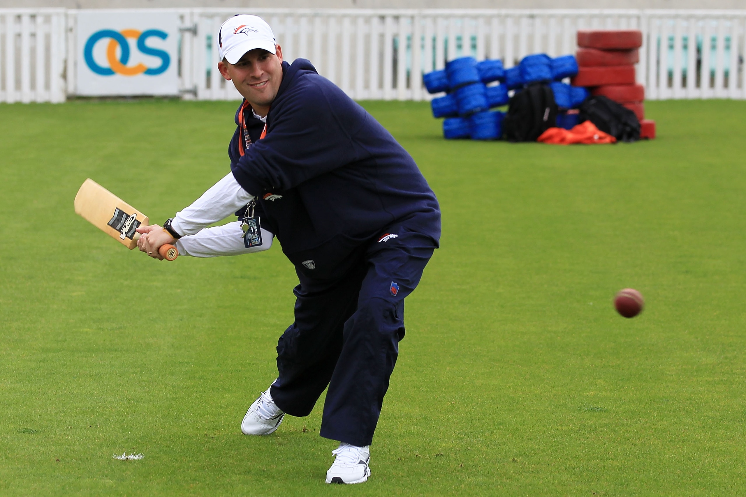 LONDON, ENGLAND - OCTOBER 29:  Head coach of the Denver Broncos Josh McDaniels plays cricket prior to the start of a team training session at The Brit Oval on October 29, 2010 in London, England. The Denver Broncos will play the San Francisco 49ers at Wem