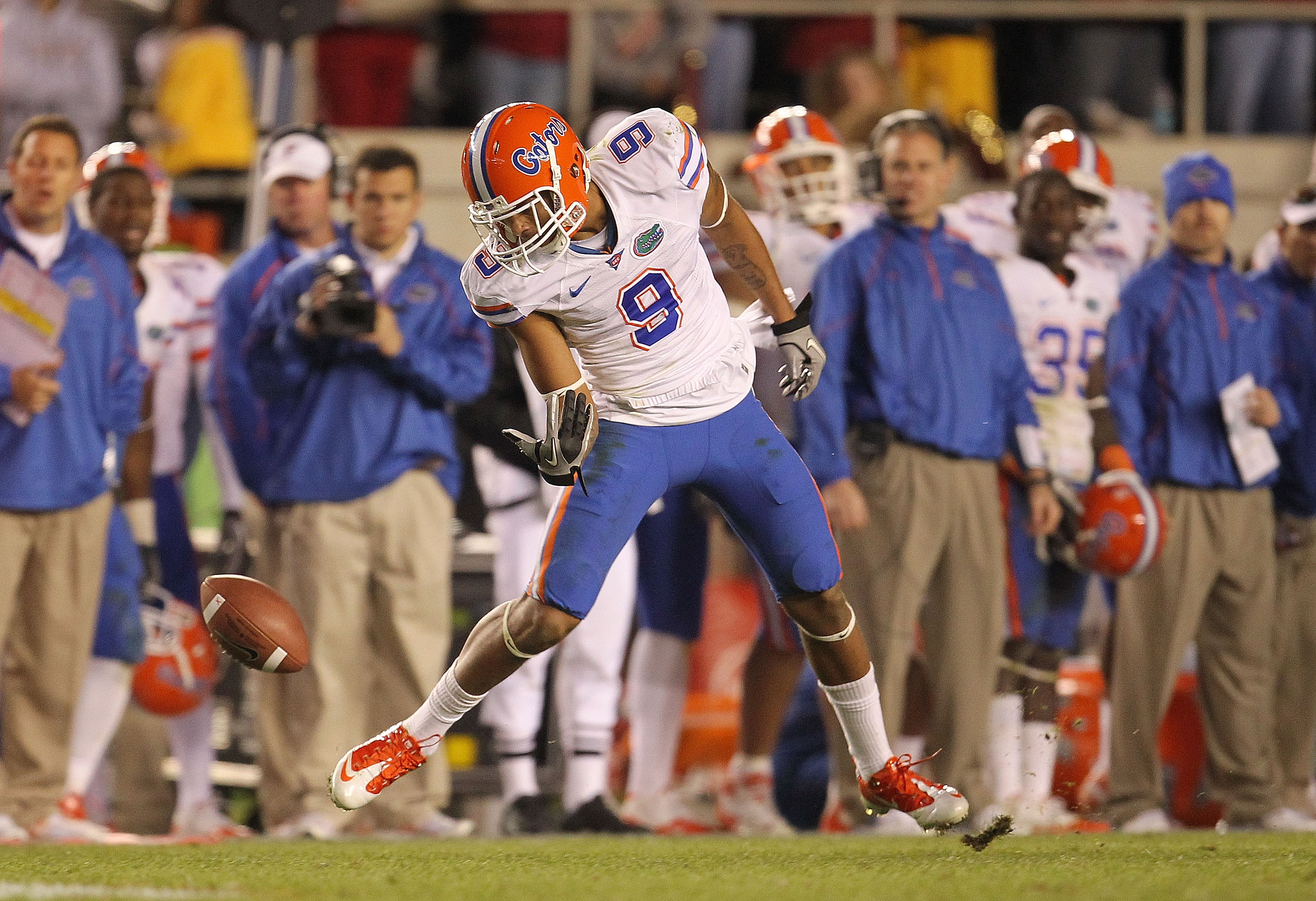 TALLAHASSEE, FL - NOVEMBER 27:  Carl Moore #9 of the Florida Gators miises a catch during a game against the Florida State Seminoles at Doak Campbell Stadium on November 27, 2010 in Tallahassee, Florida.  (Photo by Mike Ehrmann/Getty Images)