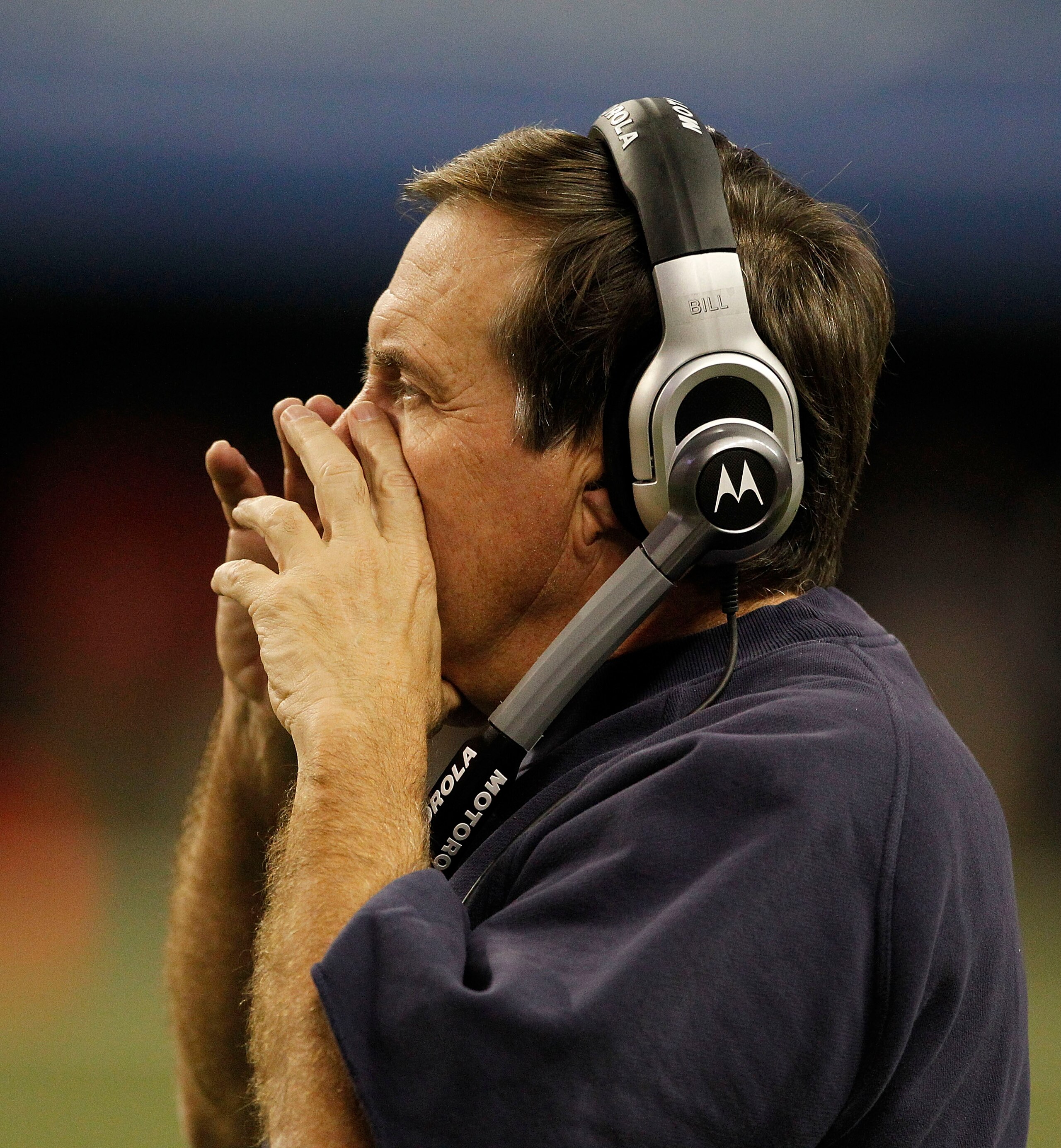 DETROIT - NOVEMBER 25: New England Patriots head coach Bill Belichick lokos on during the game against the Detroit Lions at Ford Field on November 25, 2010 in Detroit, Michigan. New England defeated Detroit 45-24. (Photo by Leon Halip/Getty Images) DETROIT - NOVEMBER 25: New England Patriots head coach Bill Belichick lokos on during the game against the Detroit Lions at Ford Field on November 25, 2010 in Detroit, Michigan. New England defeated Detroit 45-24. (Photo by Leon Halip/Getty Images)