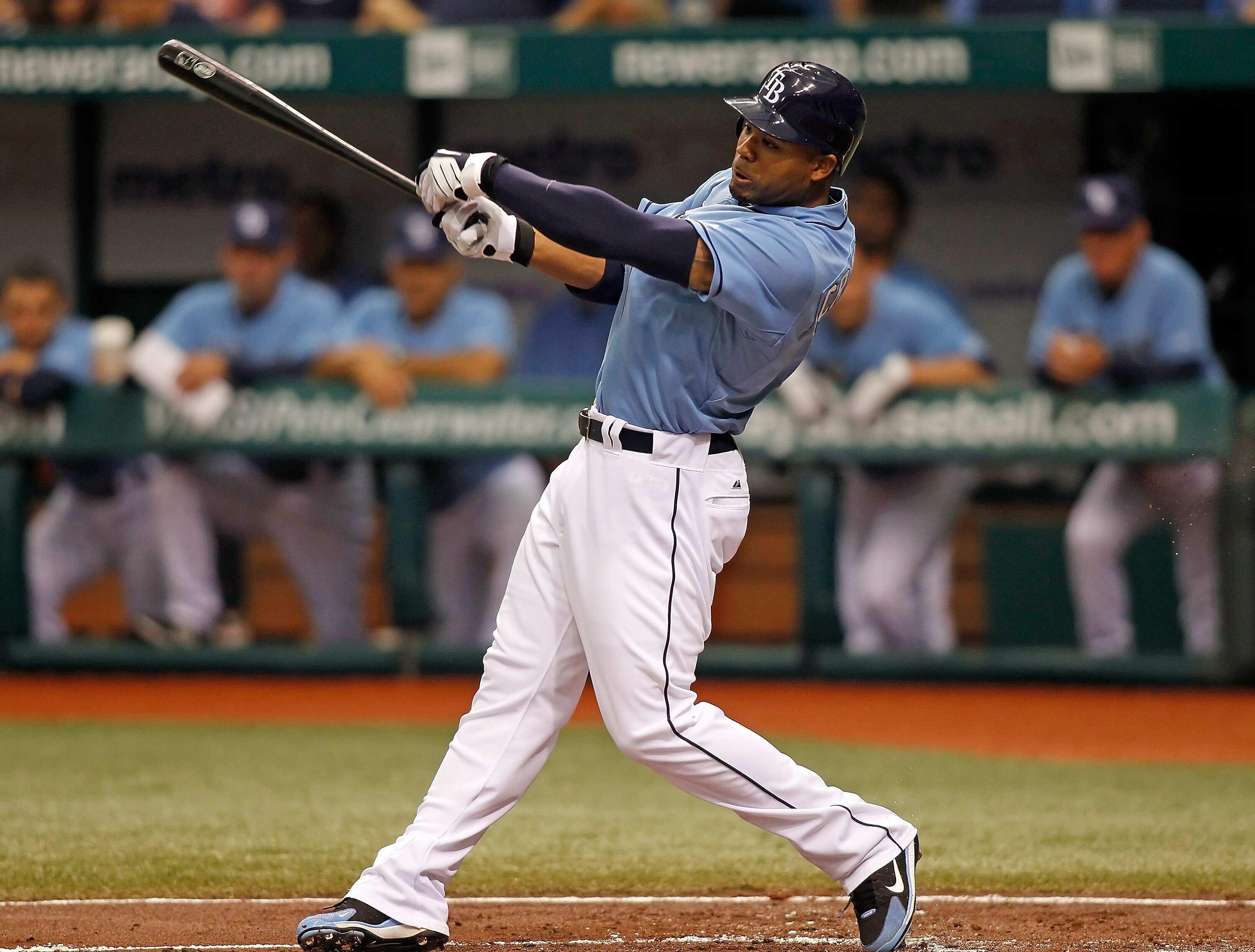 ST PETERSBURG, FL - APRIL 25:  Outfielder Carl Crawford #13 of the Tampa Bay Rays fouls off a pitch during the game against the Toronto Blue Jays  at Tropicana Field on April 25, 2010 in St. Petersburg, Florida.  (Photo by J. Meric/Getty Images)
