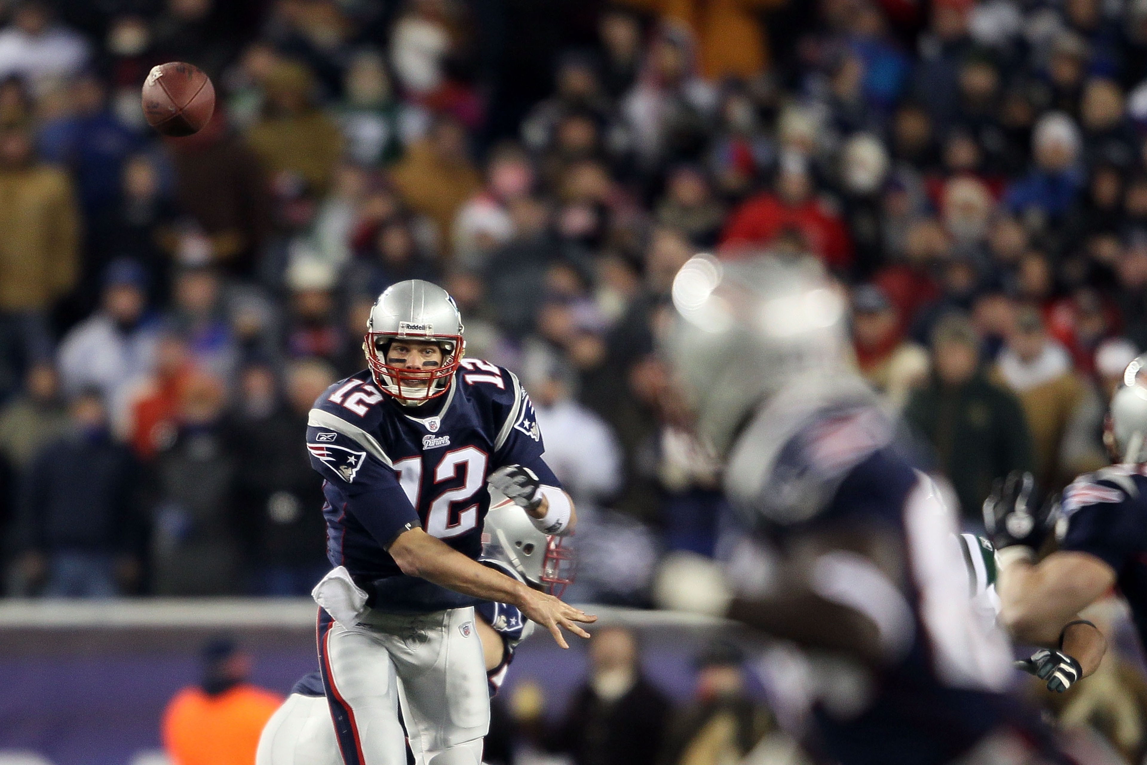 FOXBORO, MA - DECEMBER 06: Tom Brady #12 of the New England Patriots throws a pass to Deion Branch #84 against the New York Jets at Gillette Stadium on December 6, 2010 in Foxboro, Massachusetts. (Photo by Elsa/Getty Images) FOXBORO, MA - DECEMBER 06: Tom Brady #12 of the New England Patriots throws a pass to Deion Branch #84 against the New York Jets at Gillette Stadium on December 6, 2010 in Foxboro, Massachusetts. (Photo by Elsa/Getty Images)