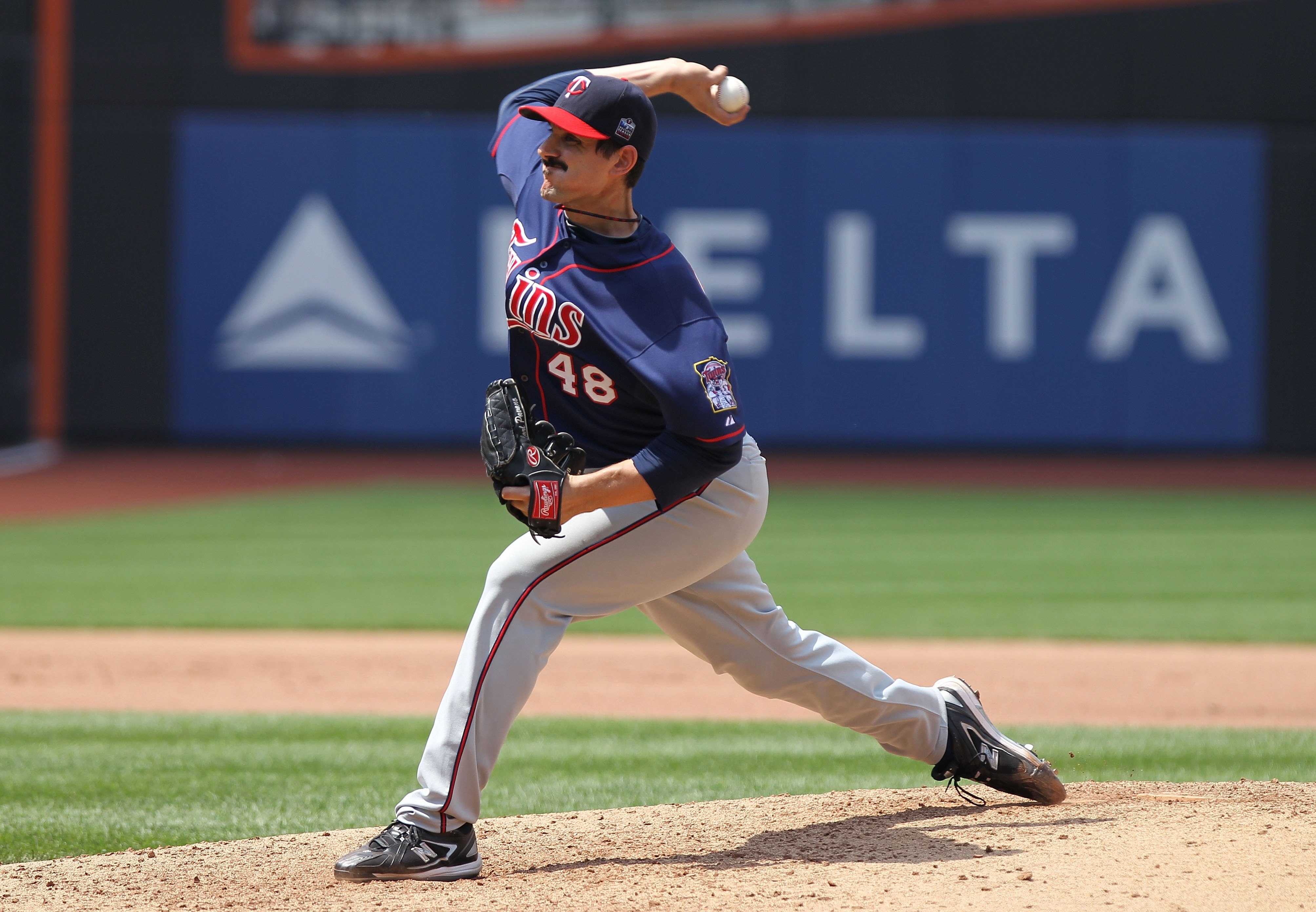 NEW YORK - JUNE 26:  Carl Pavano #48 of the Minnesota Twins pitches against the New York Mets at Citi Field on June 26, 2010 in the Flushing neighborhood of the Queens borough of New York City.  (Photo by Nick Laham/Getty Images)