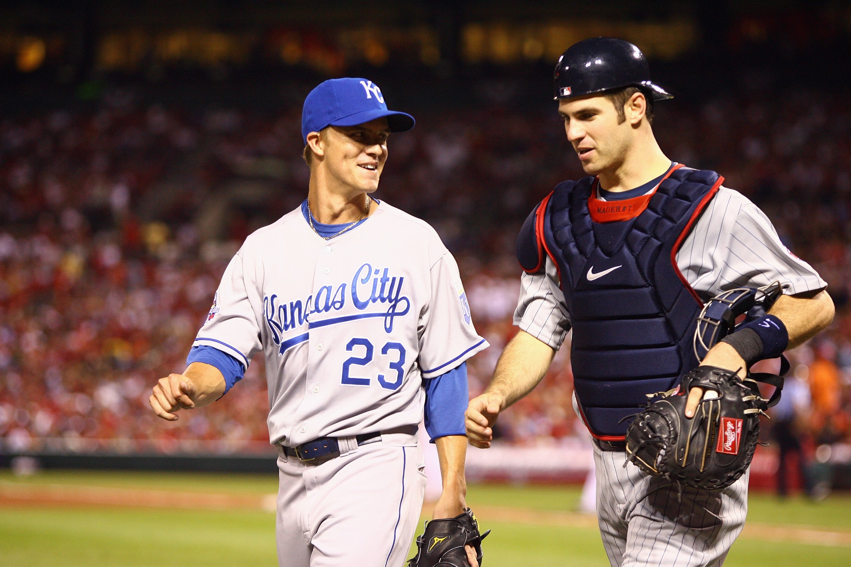 ST. LOUIS, MO - JULY 14:  American League All-Stars Zack Greinke of the Kansas City Royals and Joe Mauer of the Minnesota Twins walk off the field during the 2009 MLB All-Star Game at Busch Stadium on July 14, 2009 in St Louis, Missouri. (Photo by Jamie S