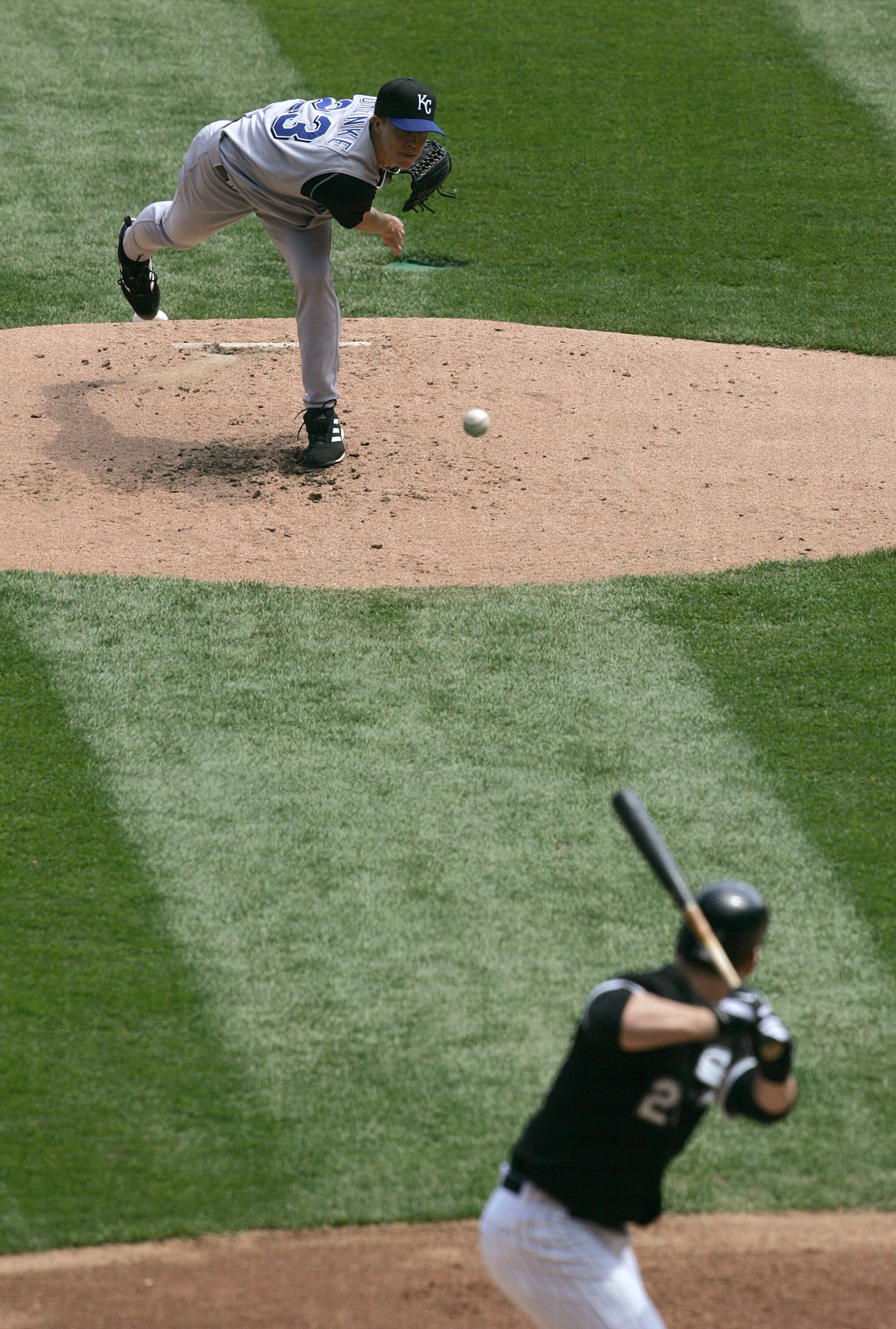 CHICAGO - MAY 5:  Starting pitcher Zack Greinke #23 of the Kansas City Royals delivers the ball to Joe Crede #24 of the Chicago White Sox May 5, 2005 at U.S. Cellular Field in Chicago, Illinois. The White Sox defeated the Royals 2-1.  (Photo by Jonathan D